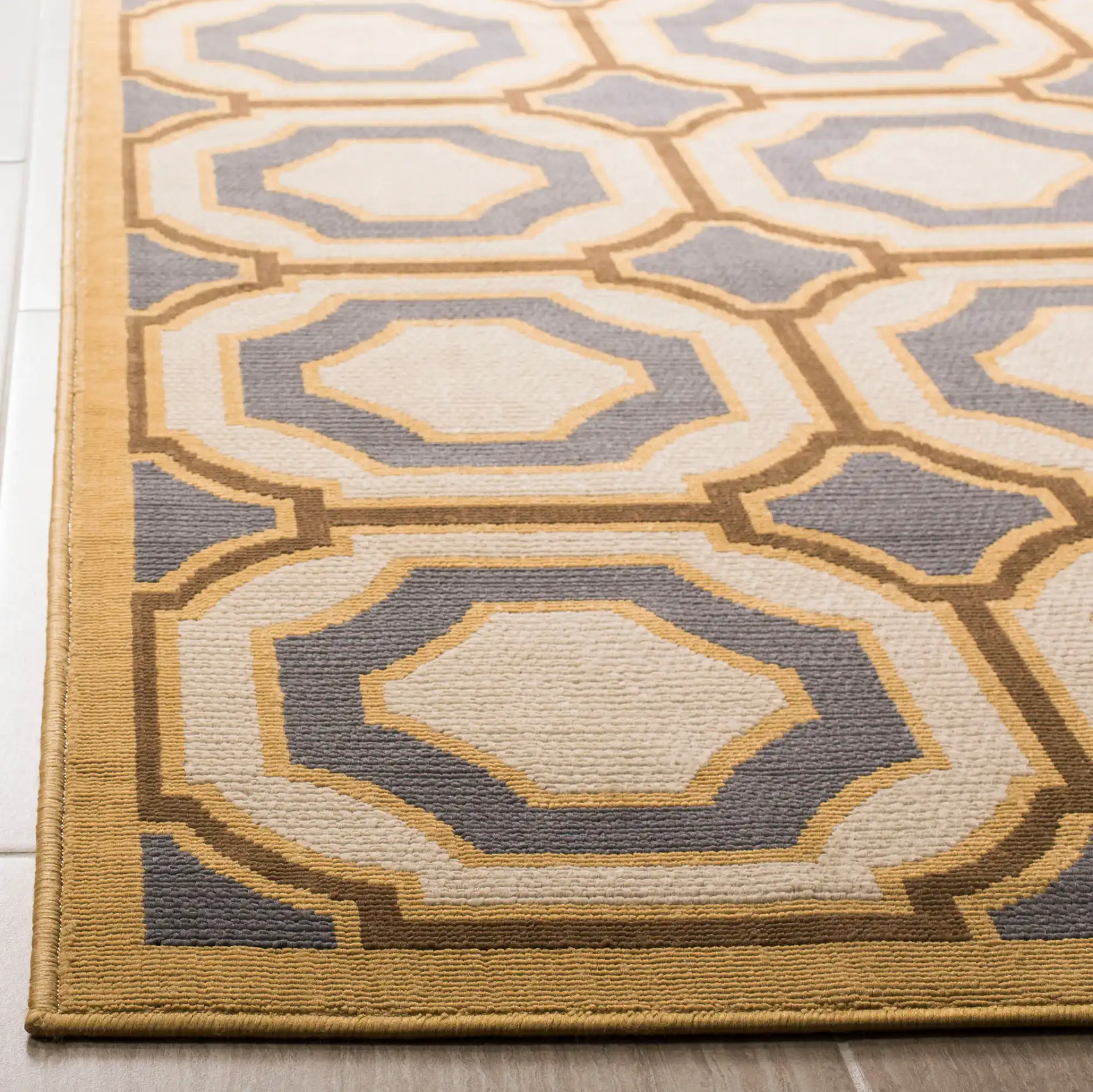 Hampton Geometric Trellis Rug in Dark Gray / Ivory in a styled room