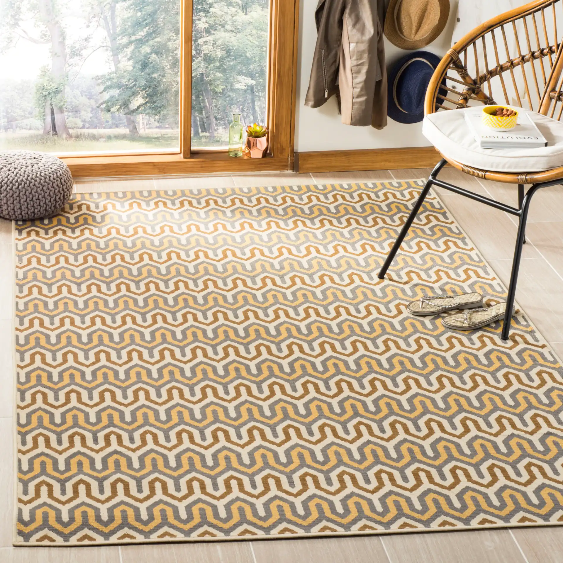 Hampton Stepped Chevron Rug in Brown / Camel in a styled room
