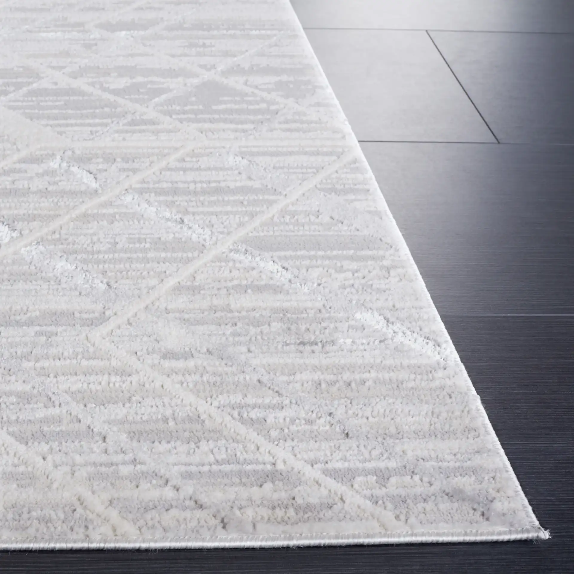 Hanna Geometric Trellis Rug in Ivory / Light Gray in a styled room