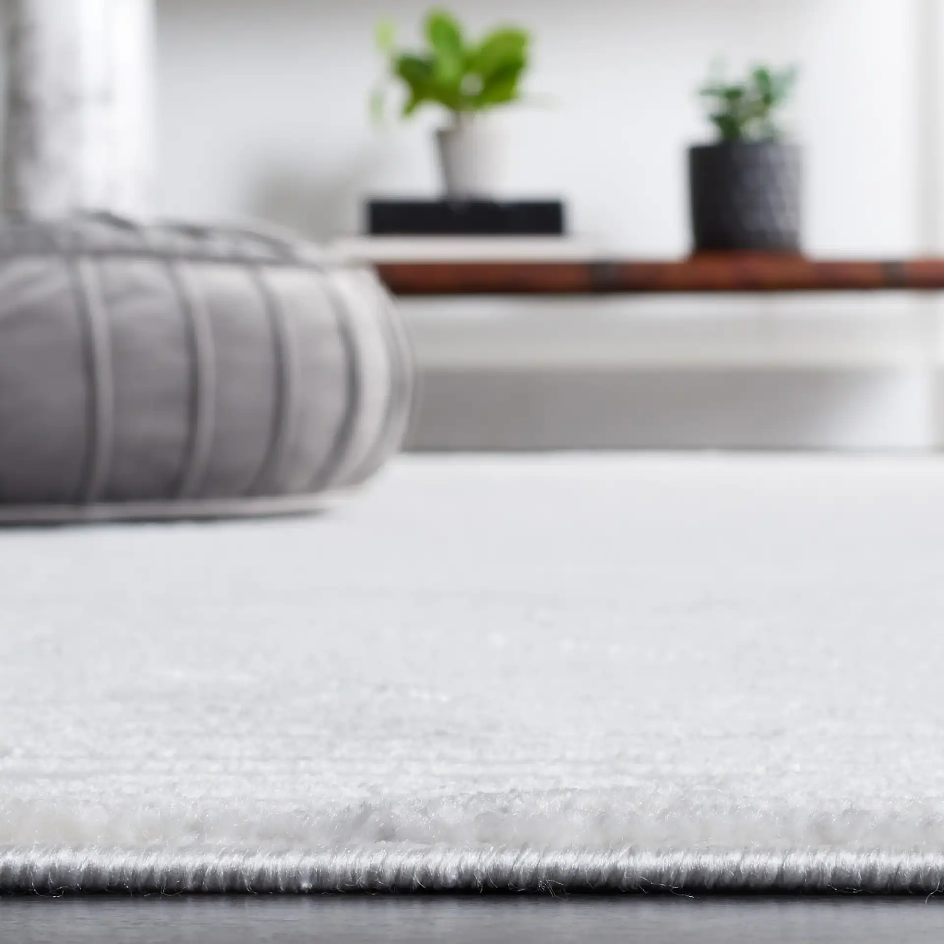 Hanna Geometric Trellis Rug in Ivory / Light Gray in a styled room