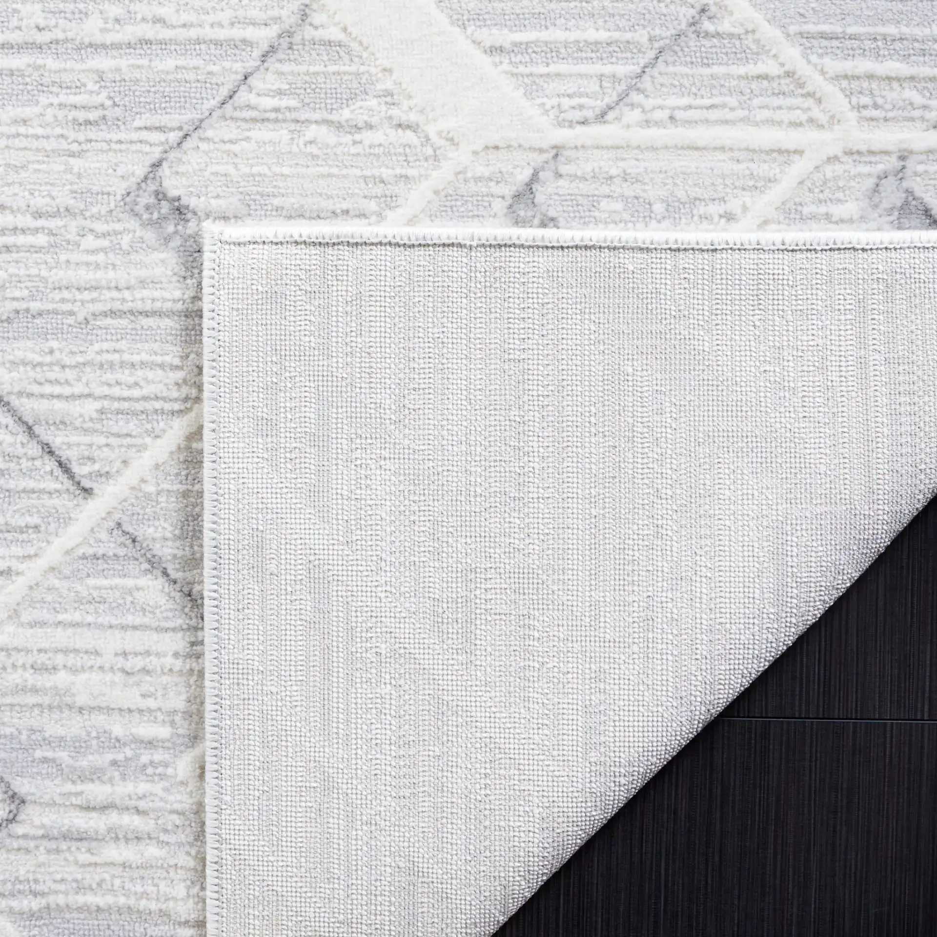 Hanna Geometric Trellis Rug in Ivory / Light Gray in a styled room
