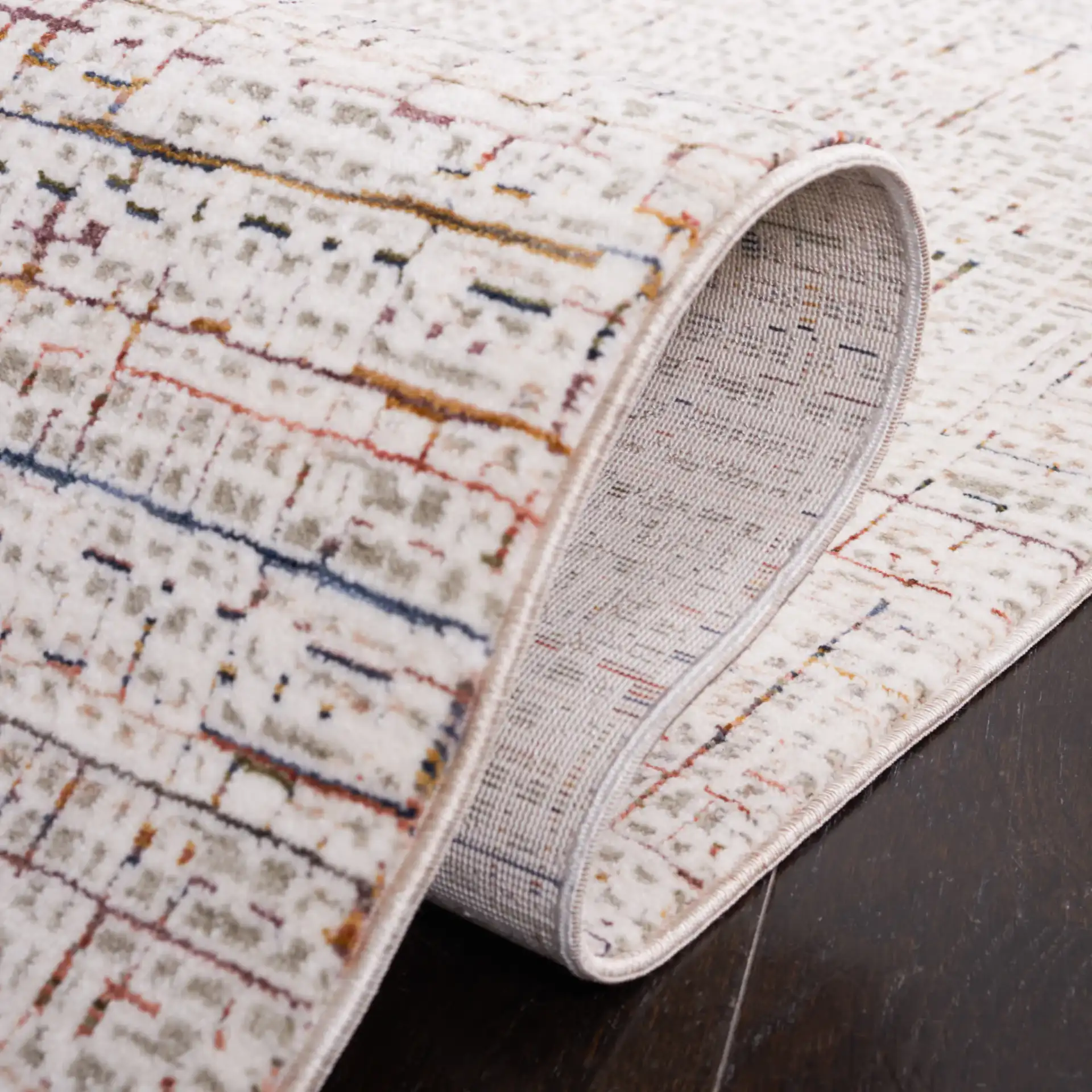 Harlow Abstract Grid Rug in Ivory Gray / Rust in a styled room