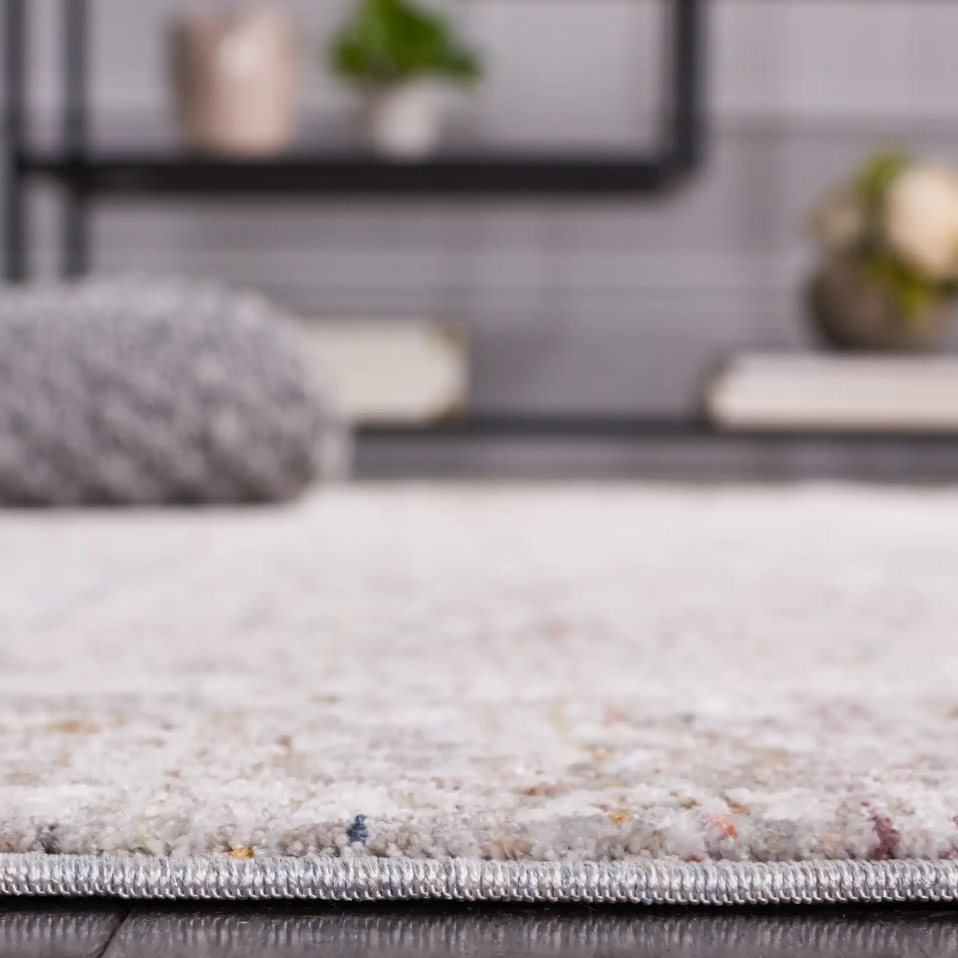 Harlow Small-Scale Floral Bordered Rug in Ivory Gray / Sage in a styled room