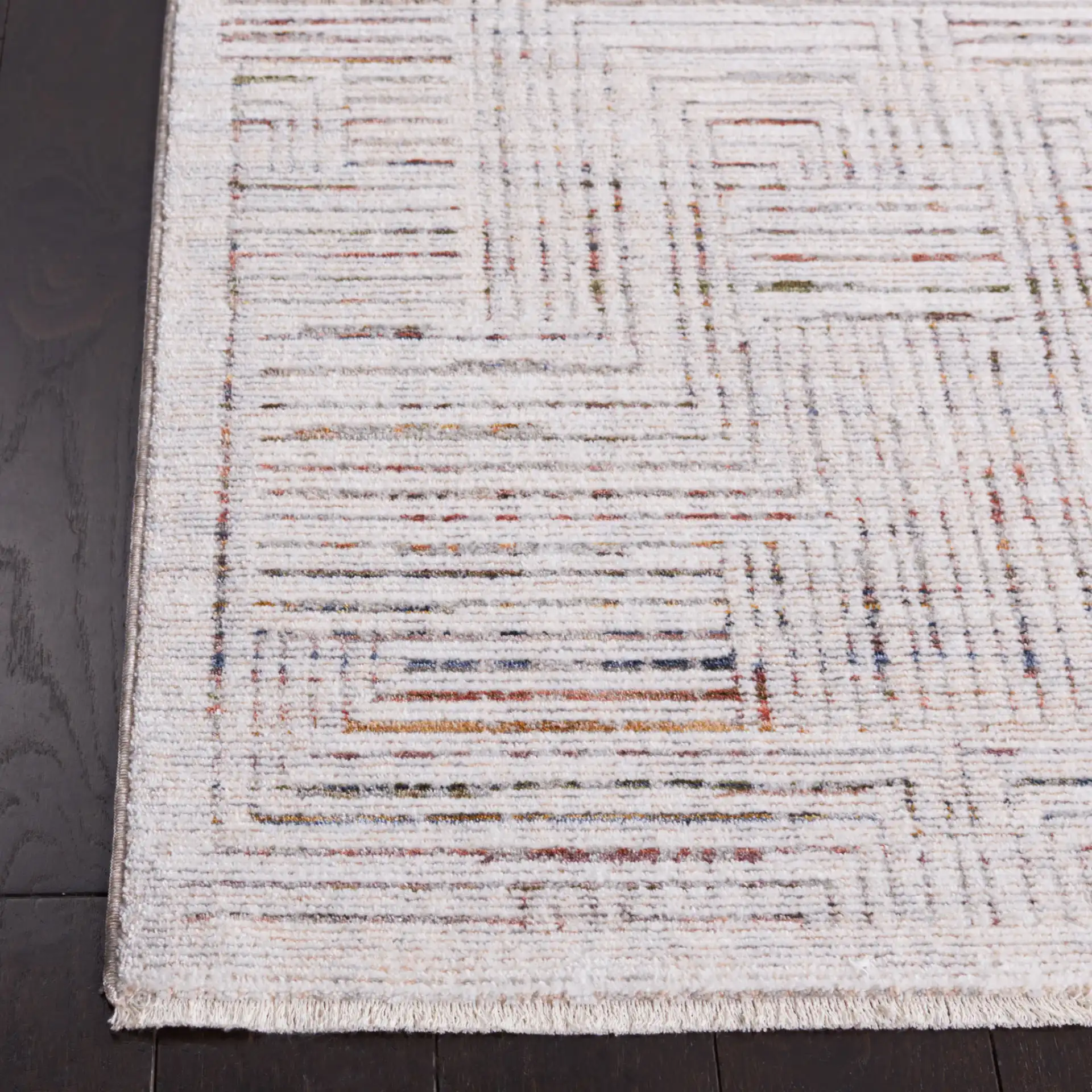 Harlow Maze Rug in Ivory Gray / Rust in a styled room