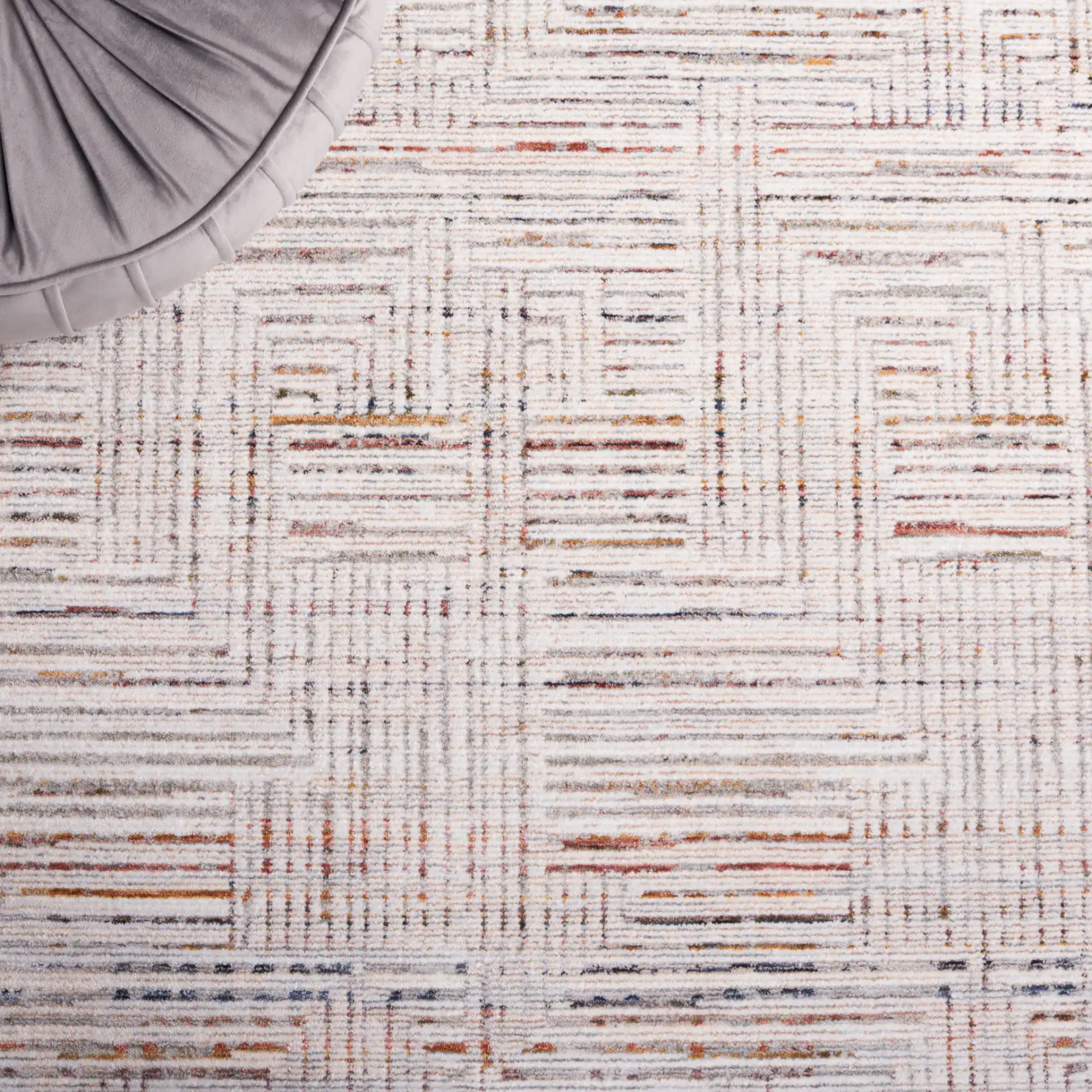 Harlow Maze Rug in Ivory Gray / Rust in a styled room
