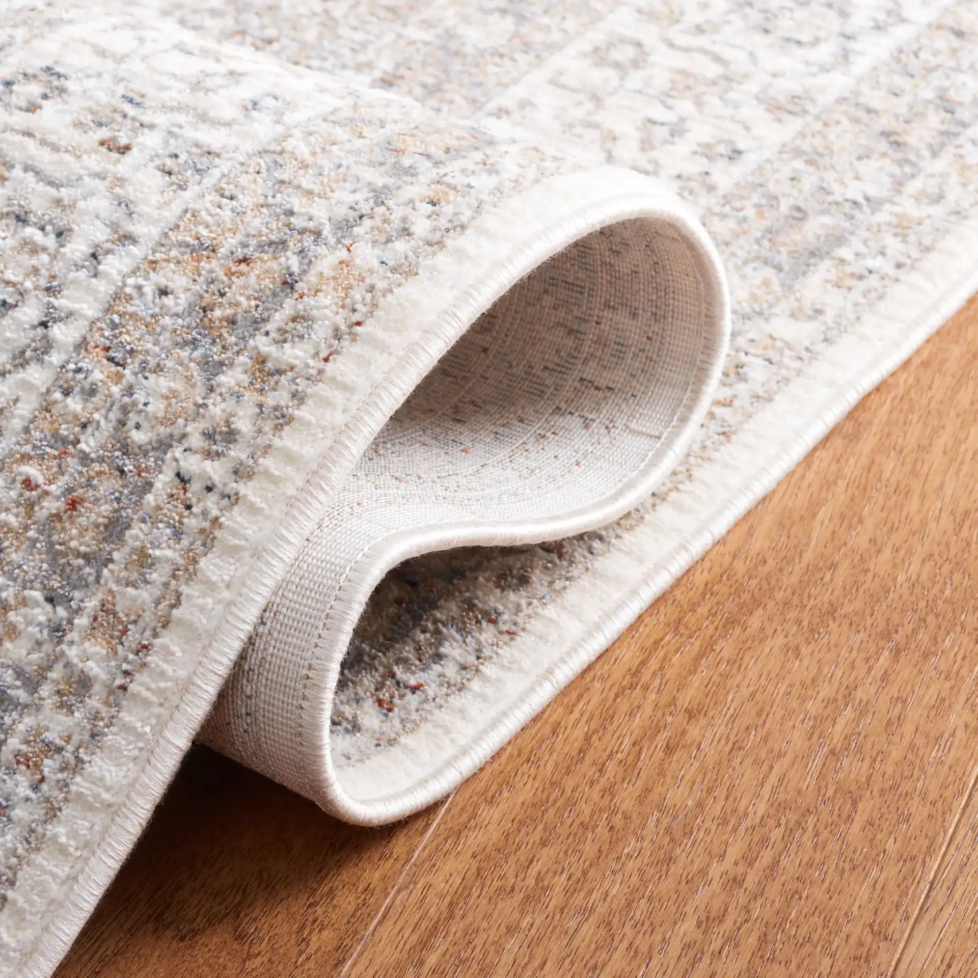 Harlow Nested Medallion Rug in Ivory / Gray Beige in a styled room