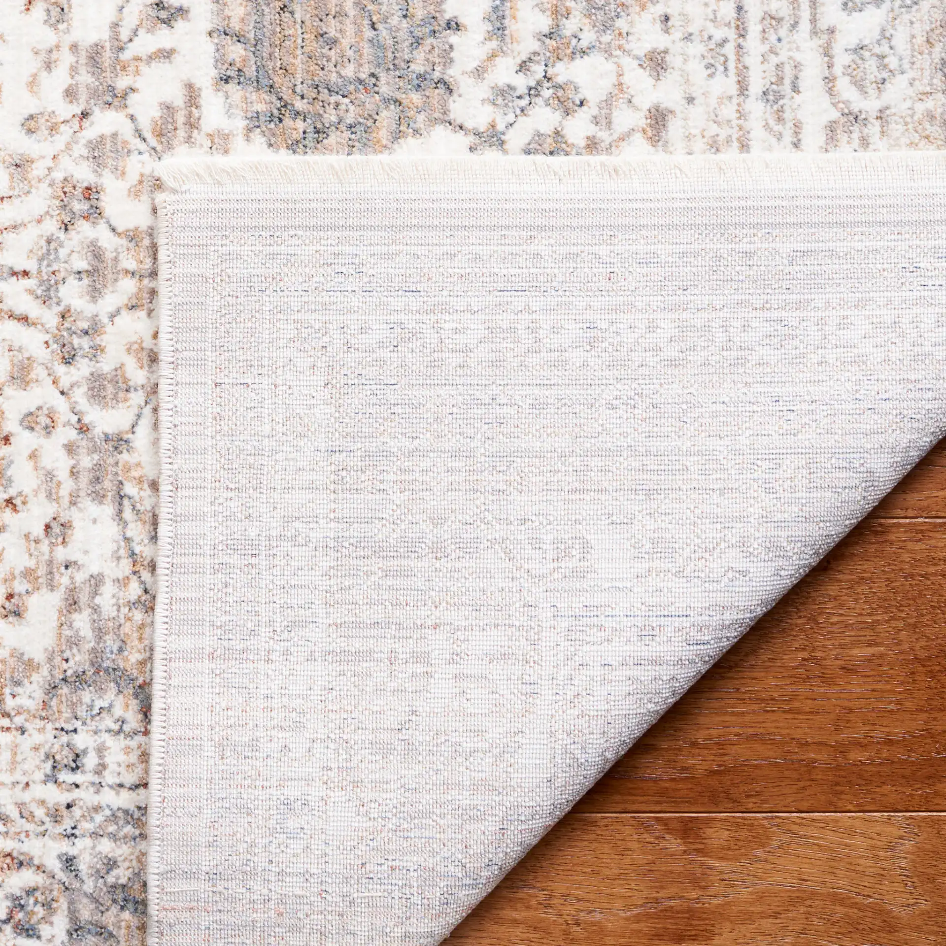 Harlow Bordered Floral Rug in Gray / Ivory Blue in a styled room