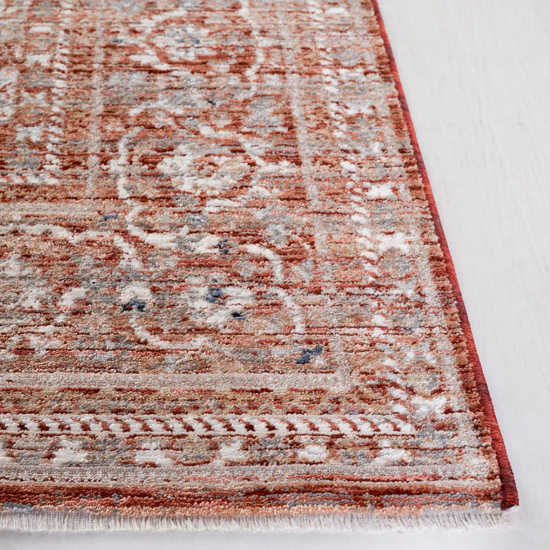 Harlow Floral Medallion Rug in Rust / Ivory Gray in a styled room