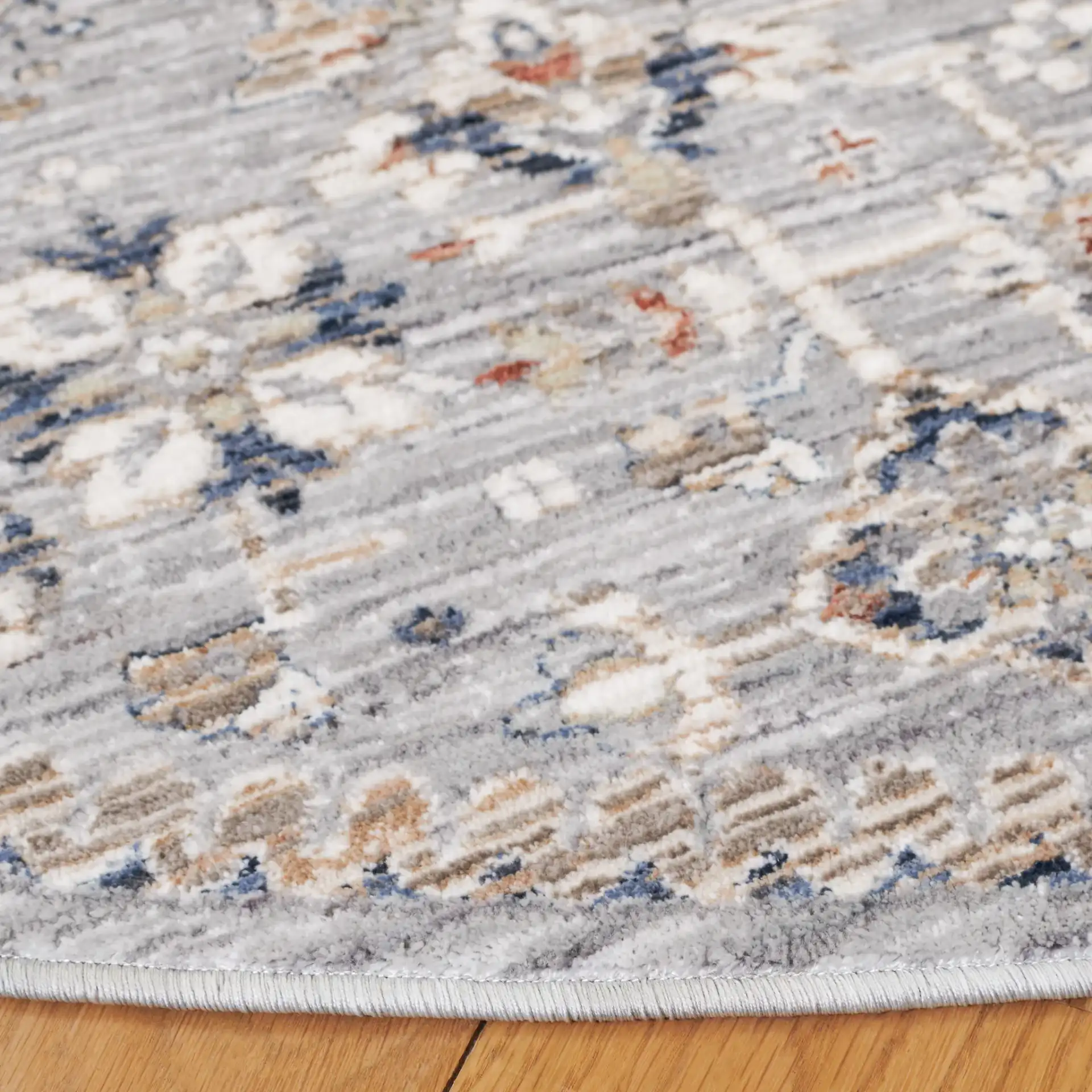 Harlow Medallion Rug in Light Gray / Beige Blue in a styled room