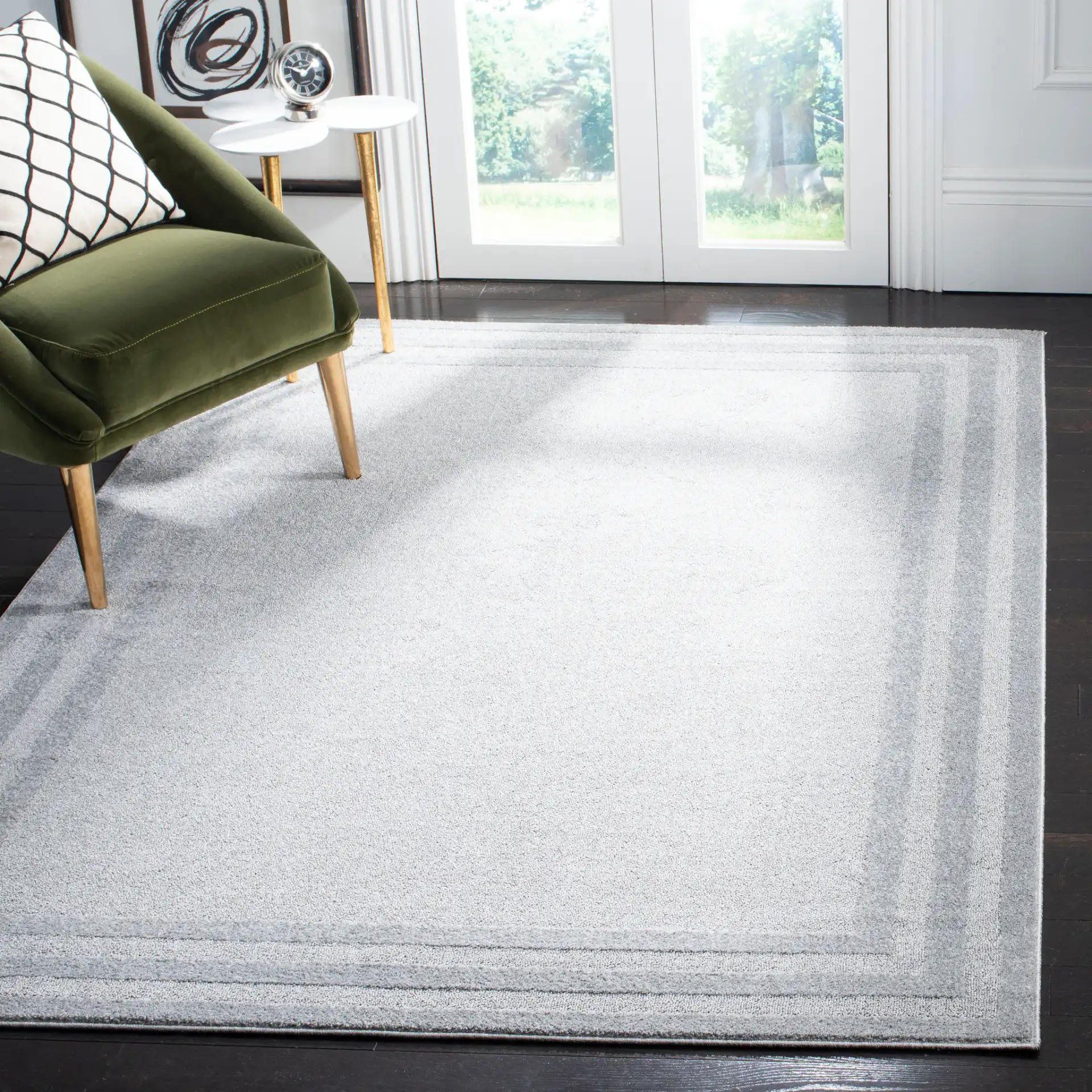 Harbor Concentric Ring Rug in Light Gray / Dark Gray in a styled room