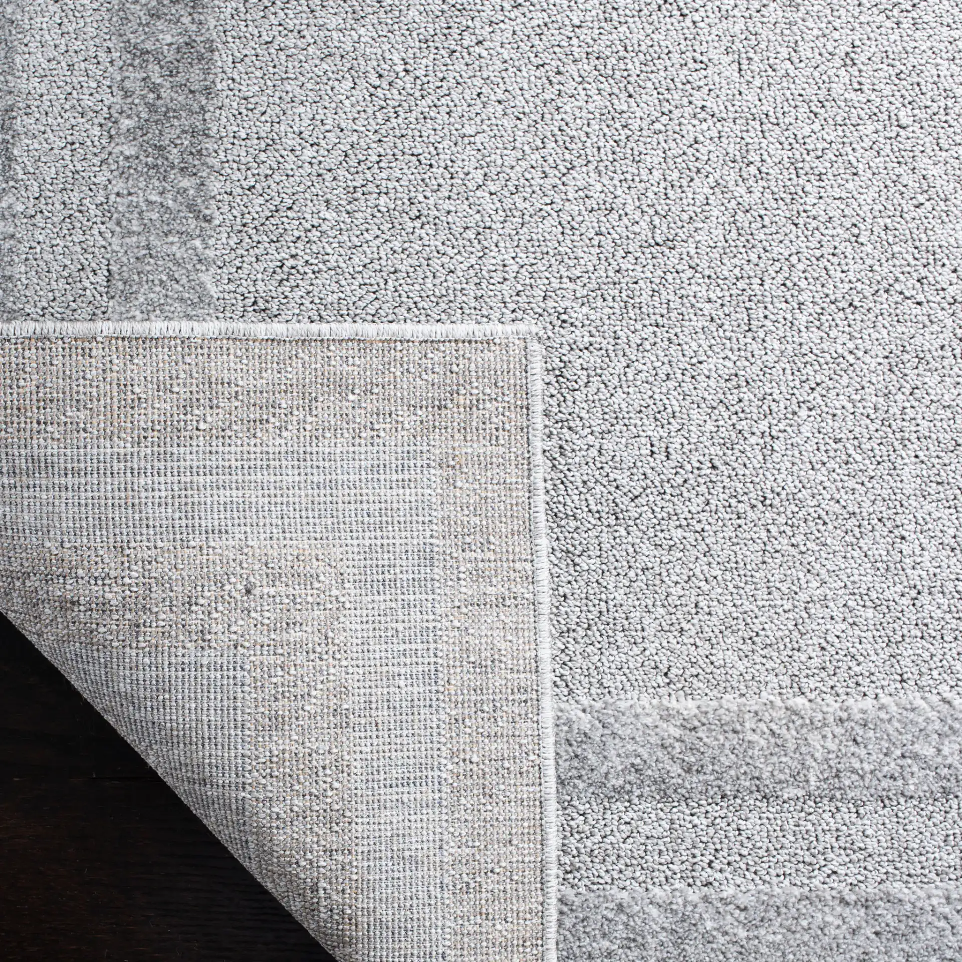 Harbor Concentric Ring Rug in Light Gray / Dark Gray in a styled room