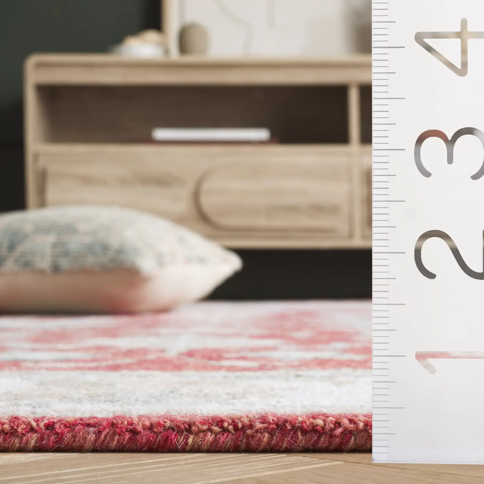 Heritage Bordered Floral Hand-Tufted Wool Rug in Red / Ivory in a styled room