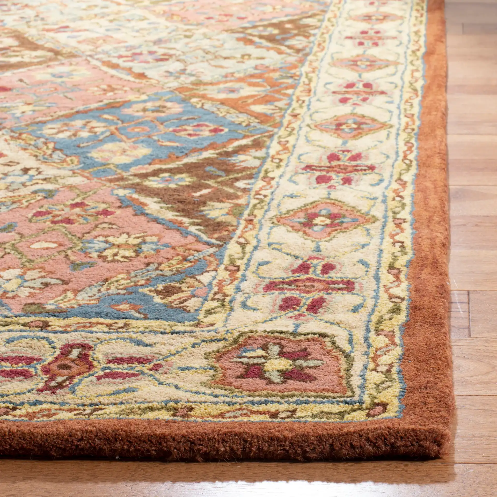 Heritage Diamond Patchwork Hand-Tufted Wool Rug in Beige in a styled room