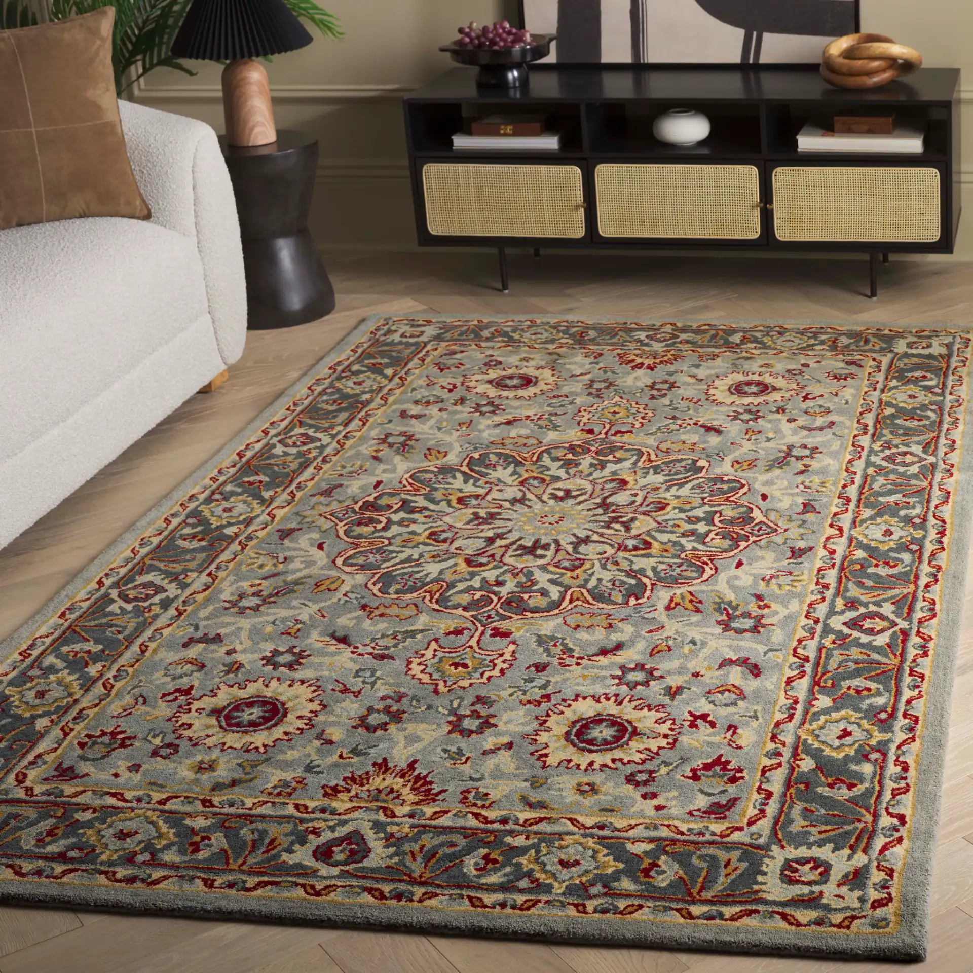 Heritage Palmette Medallion Hand-Tufted Wool Rug in Gray / Charcoal in a styled room