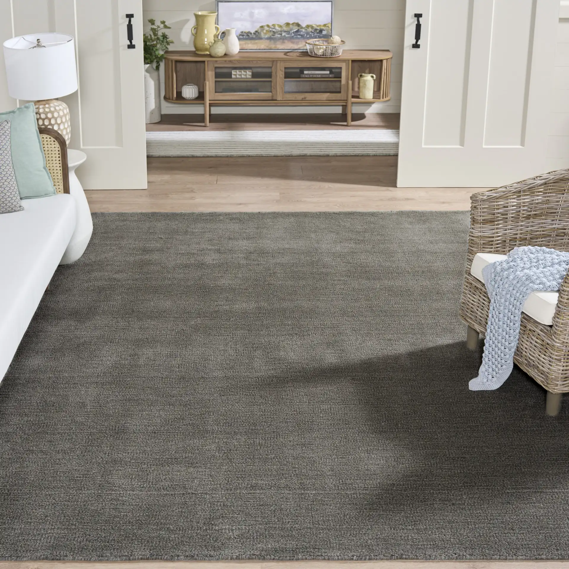 Himalaya Solid Hand-Loomed Wool Rug in Blue in a styled room