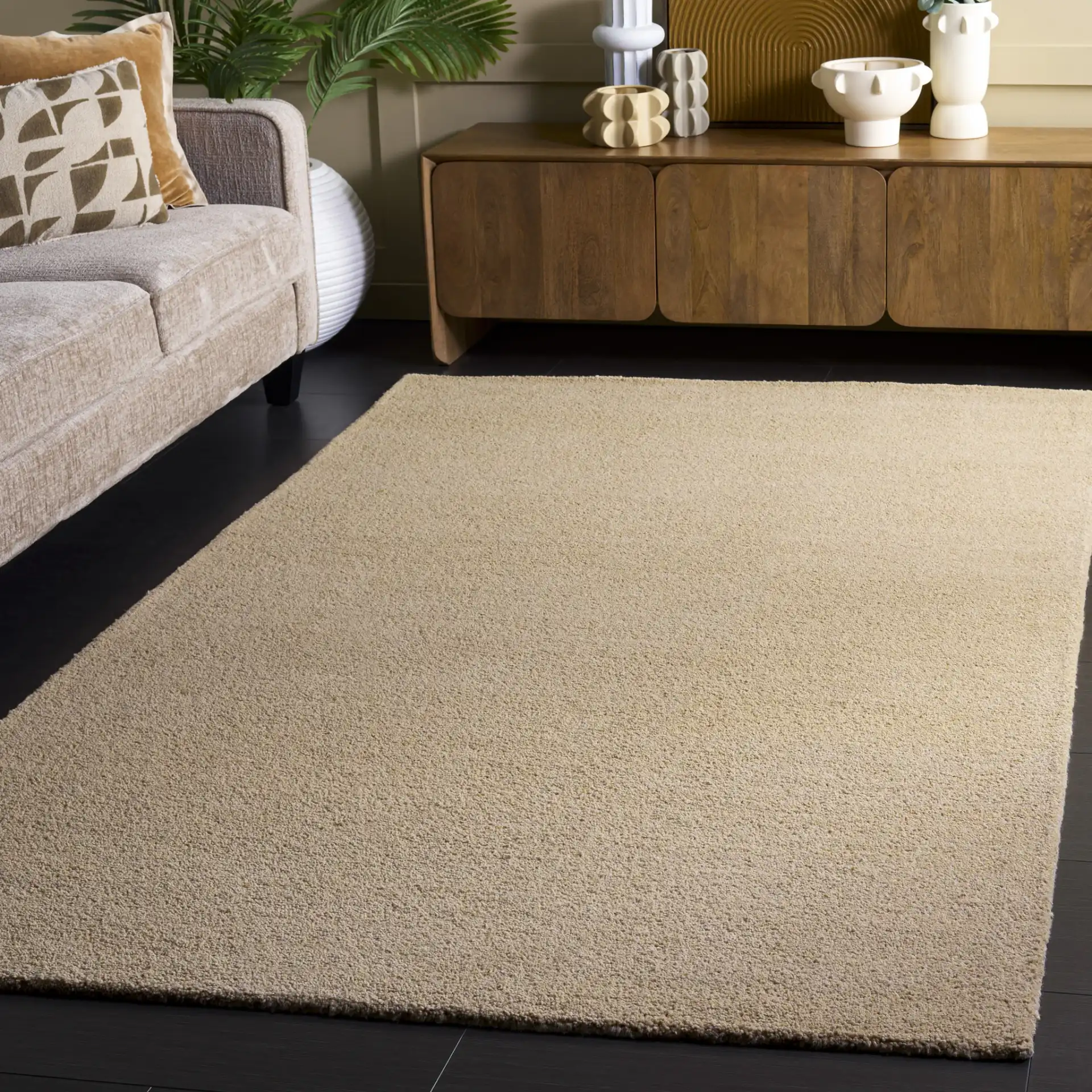Himalaya Solid Hand-Tufted Wool Rug in Beige in a styled room