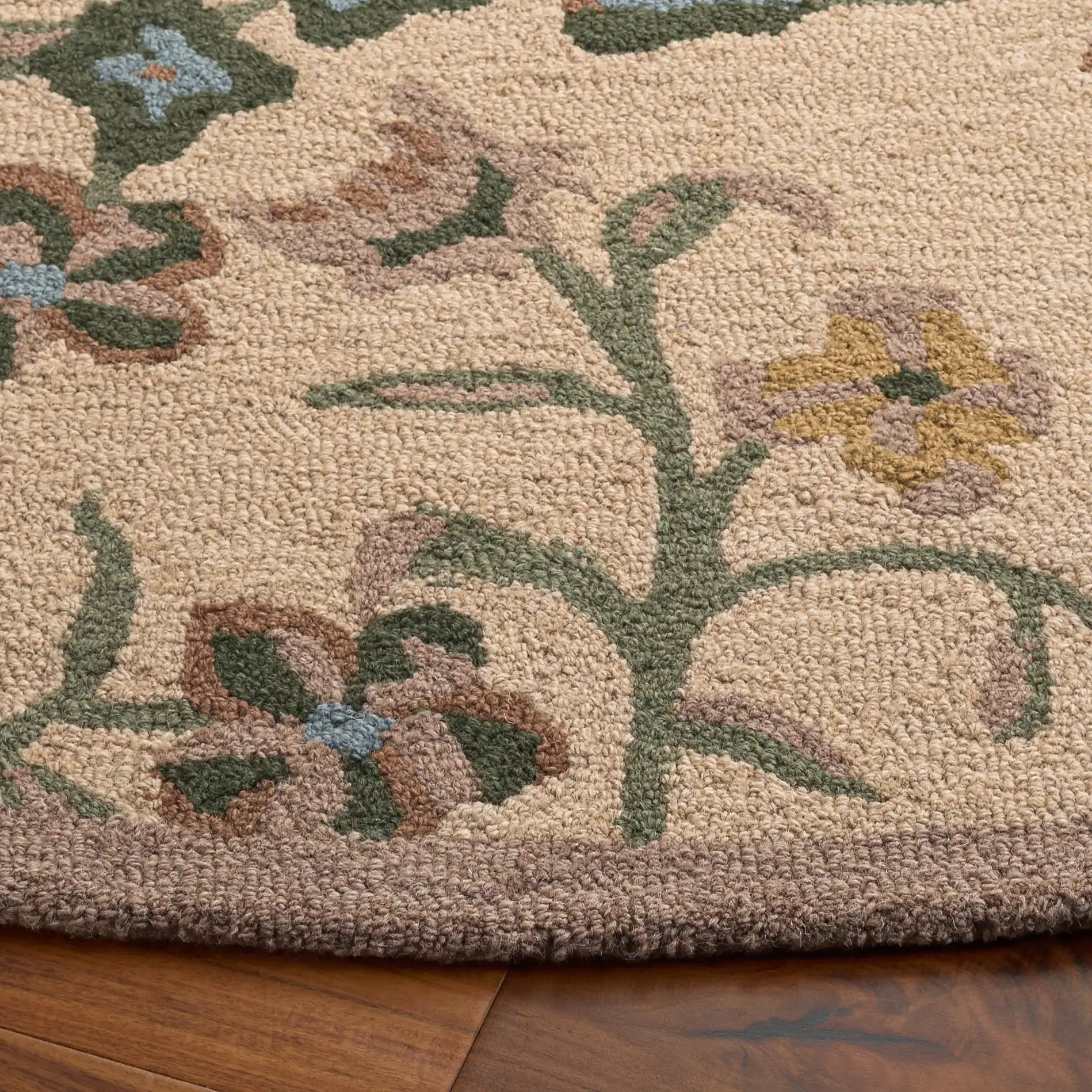 Chelsea Floral Vine Hand-Tufted Wool Rug in Beige / Green in a styled room