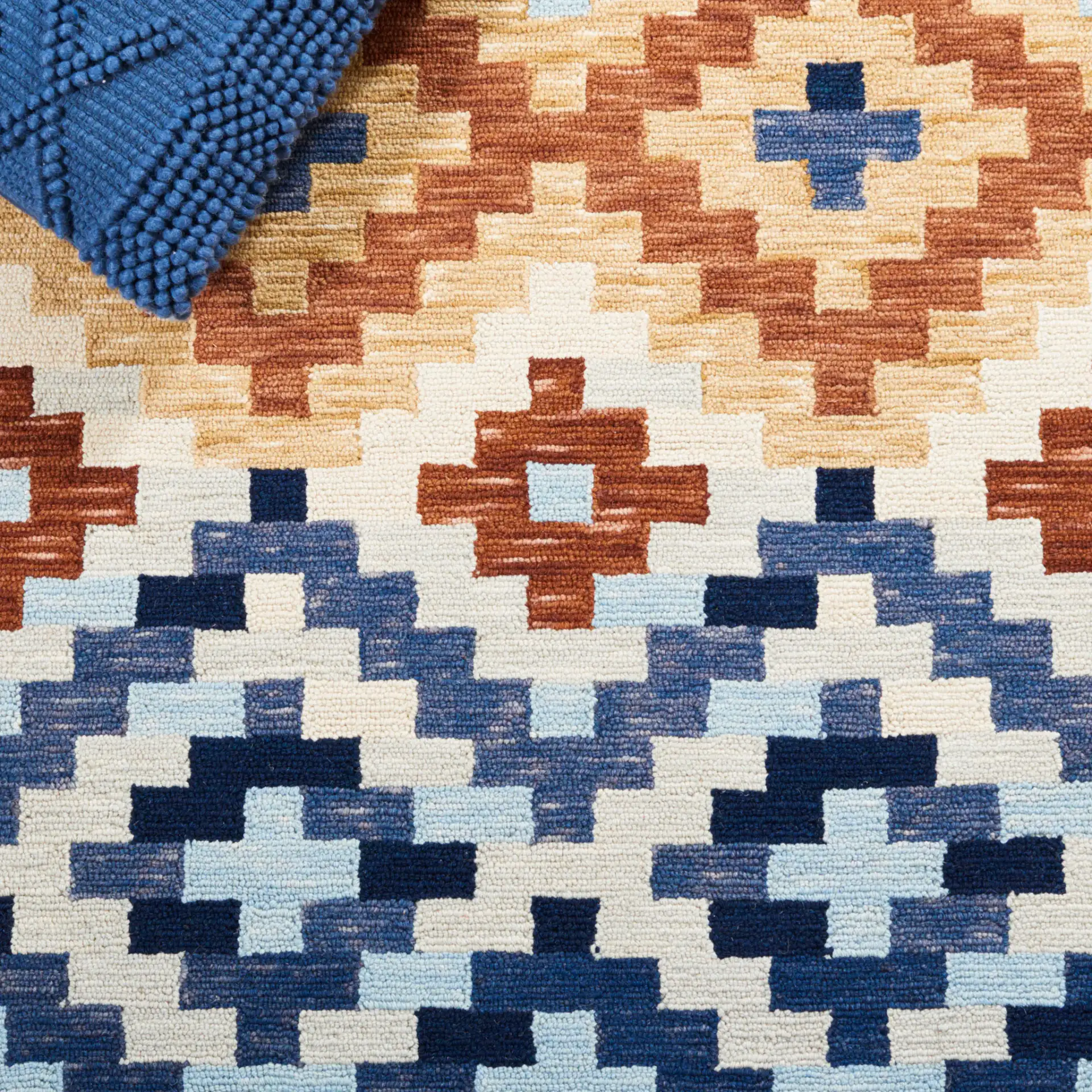 Chelsea Stepped Diamond Hand-Hooked Wool Rug in Orange / Multicolor in a styled room