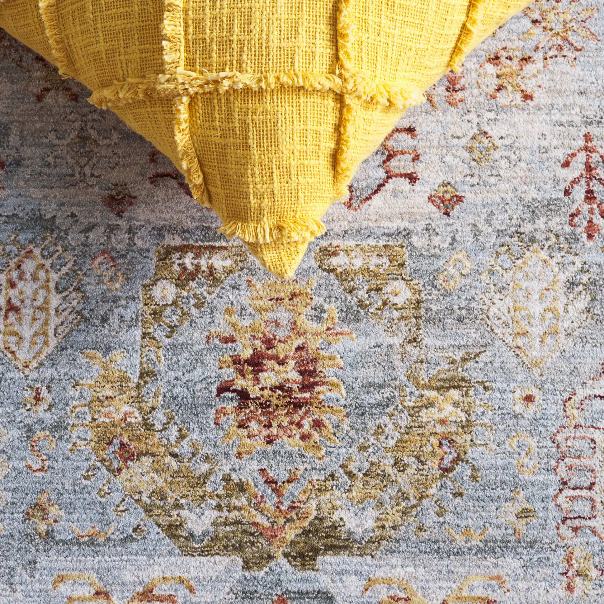 Hamilton Tribal Border Rug in Blue / Gold Rust in a styled room