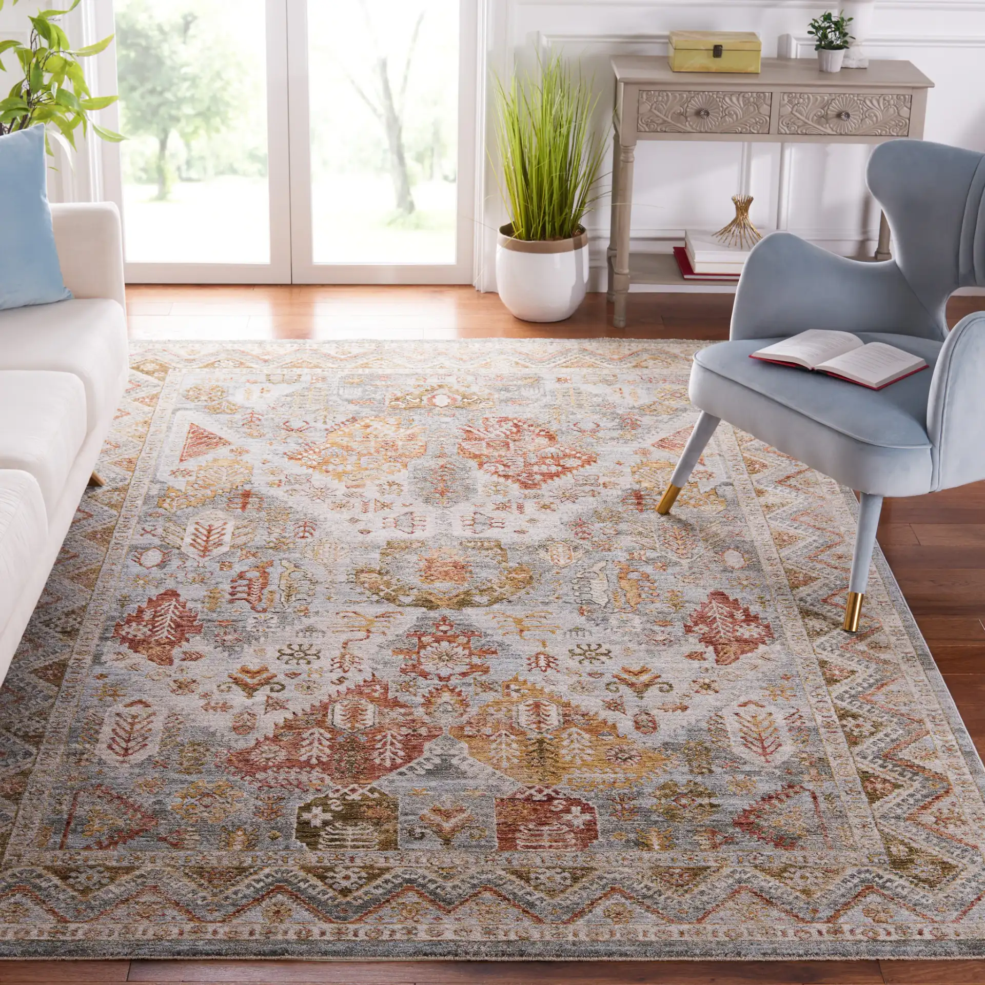 Hamilton Tribal Border Rug in Blue / Gold Rust in a styled room