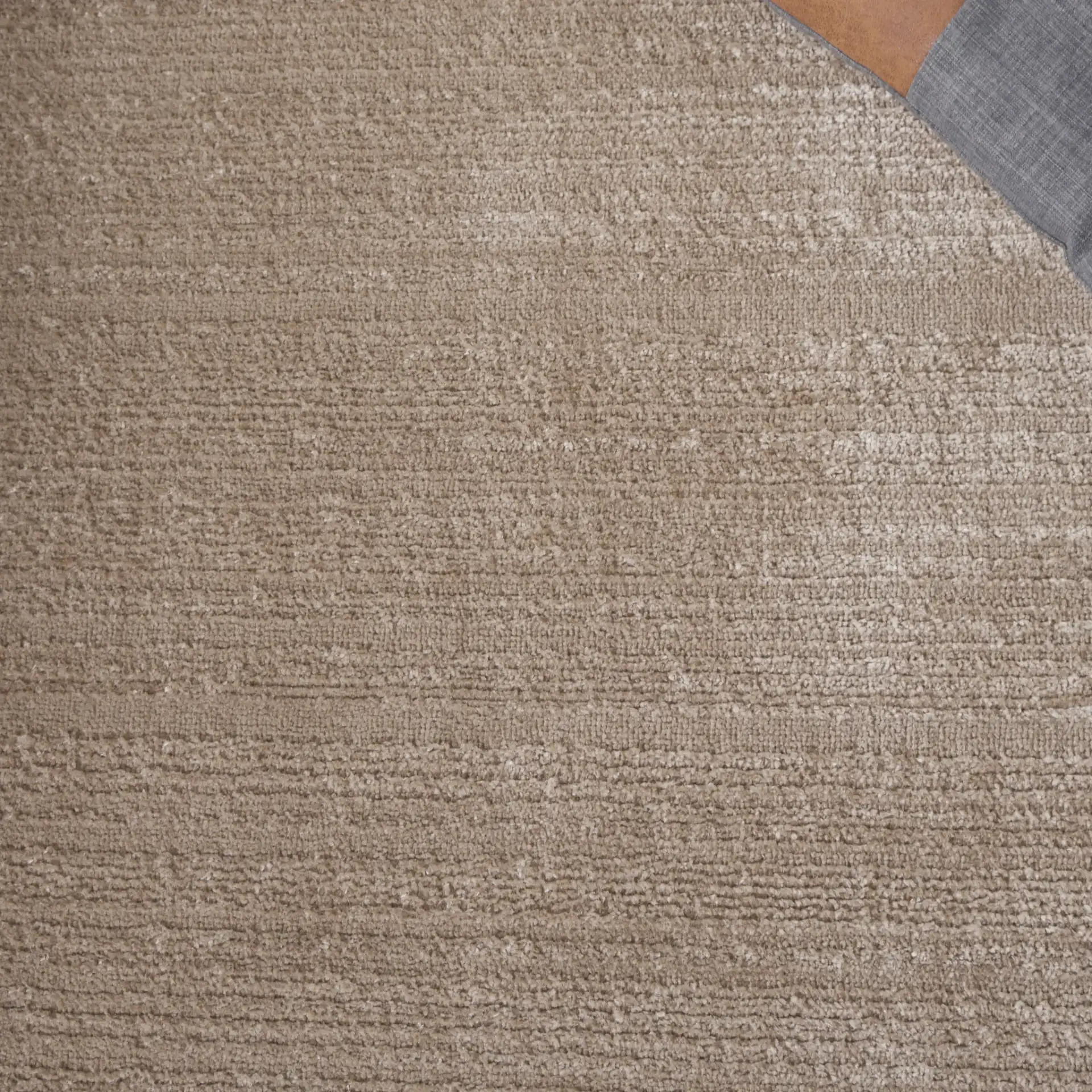 Harmony Ribbed Solid Rug in Beige in a styled room