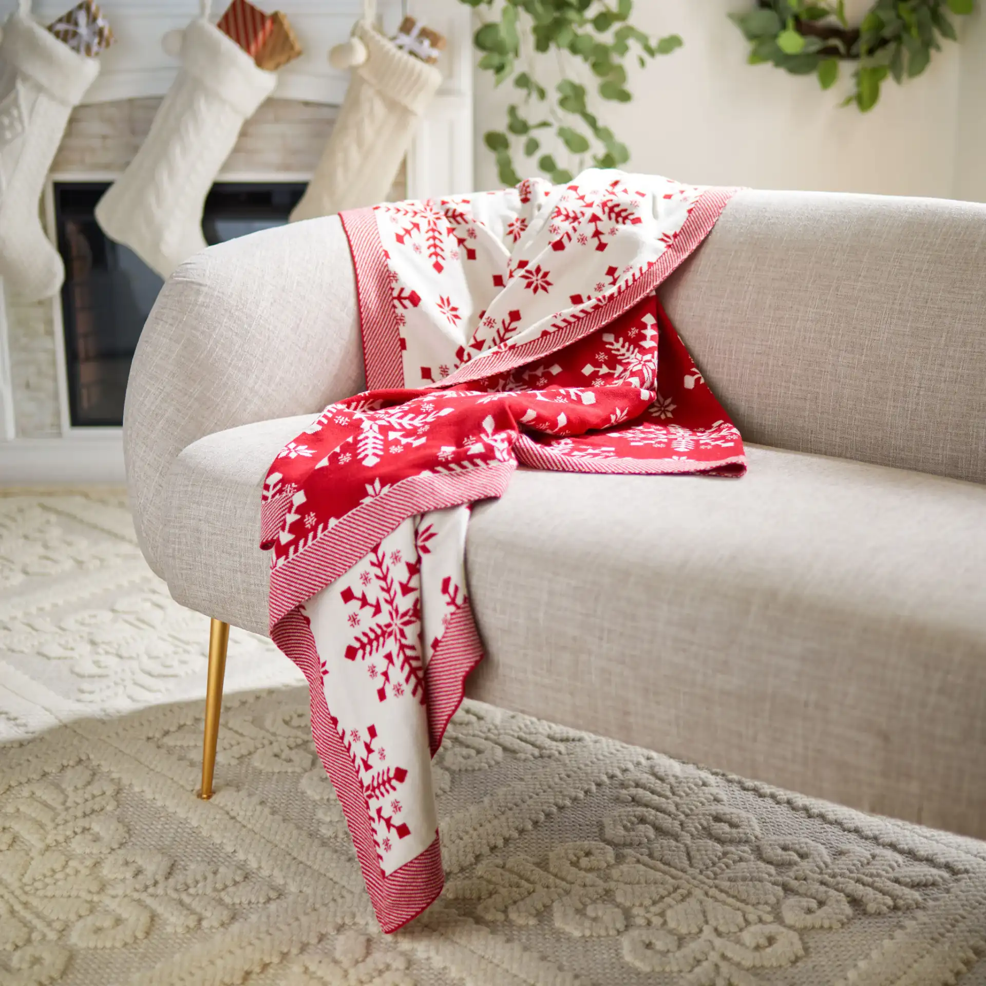 Frost Throw in Red in a styled room