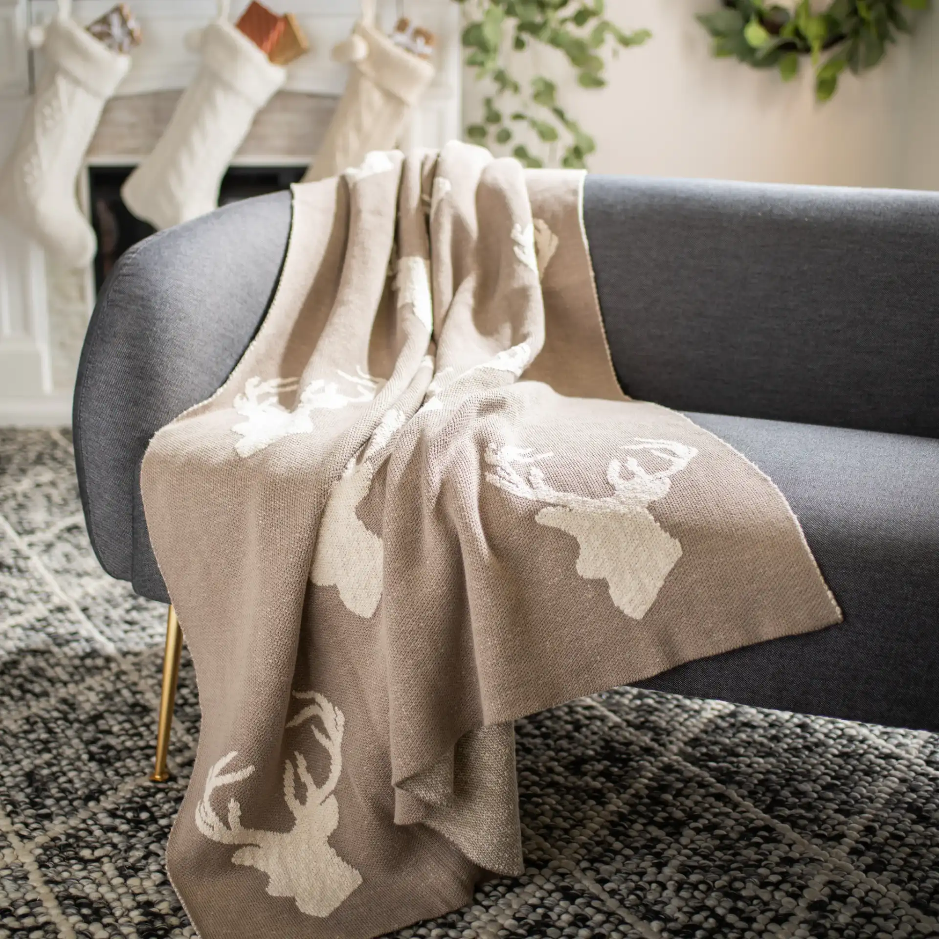 Yule Throw in Gray in a styled room