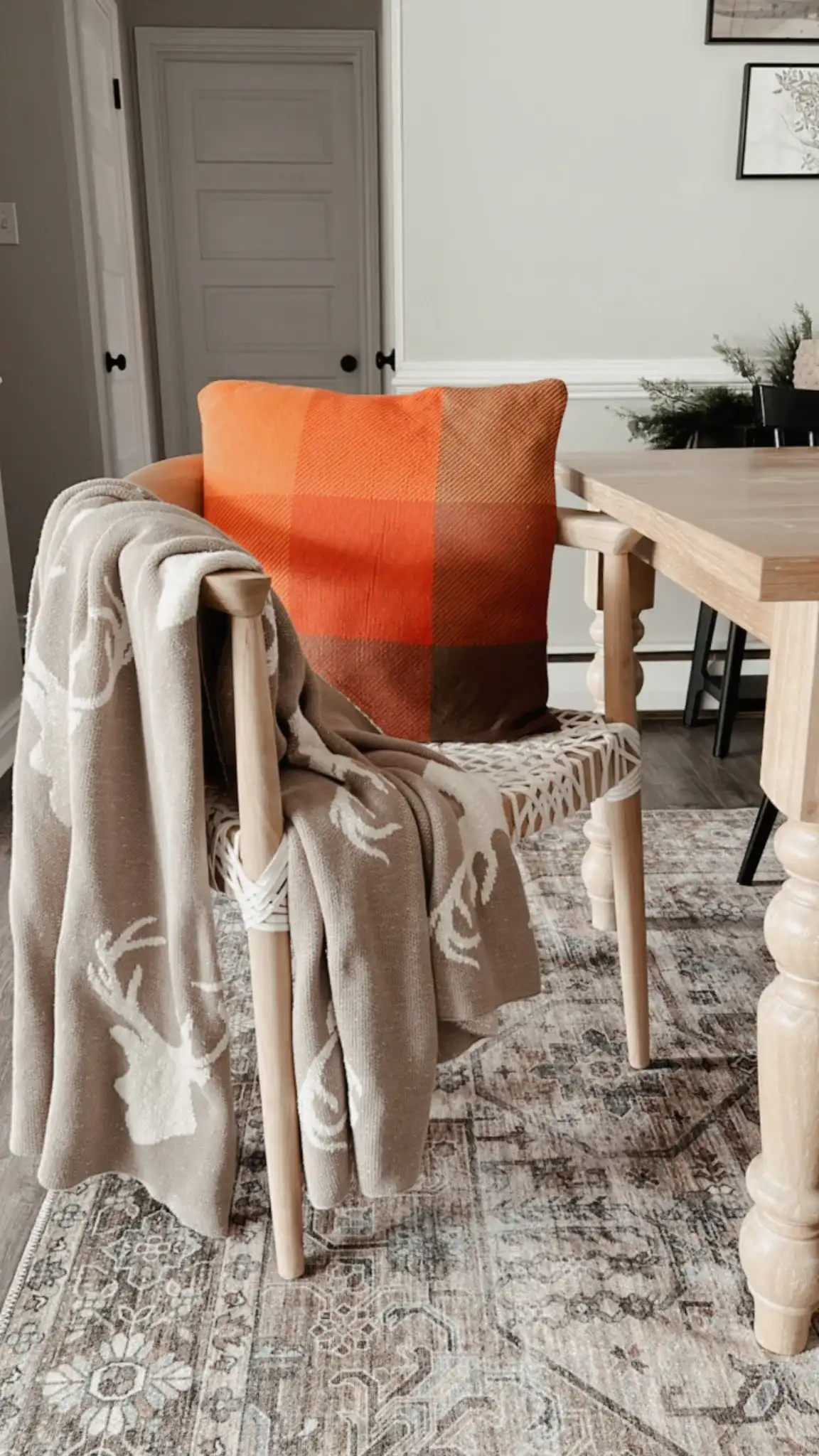 Yule Throw in Gray in a styled room