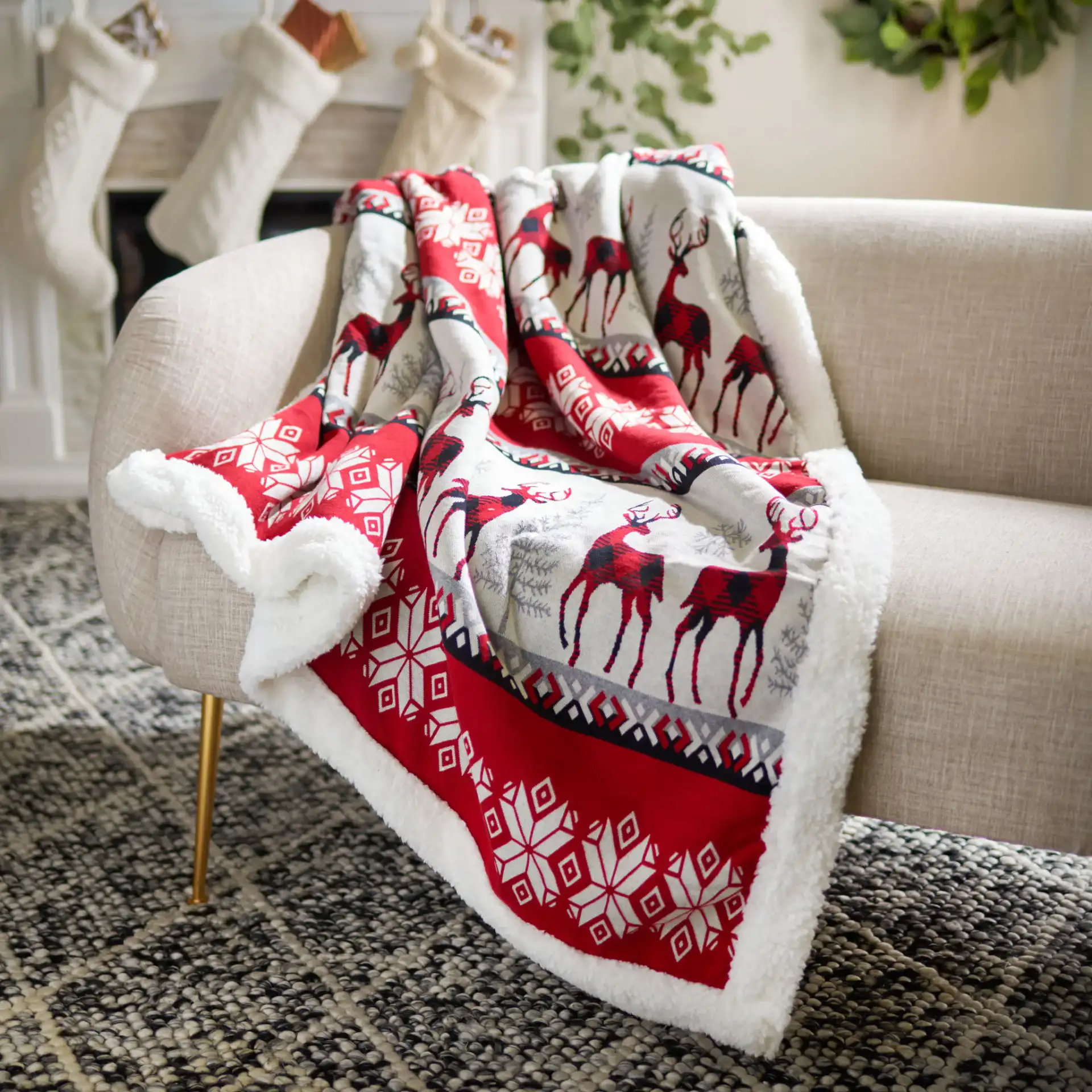 Prancer Sherpa Throw in Red in a styled room
