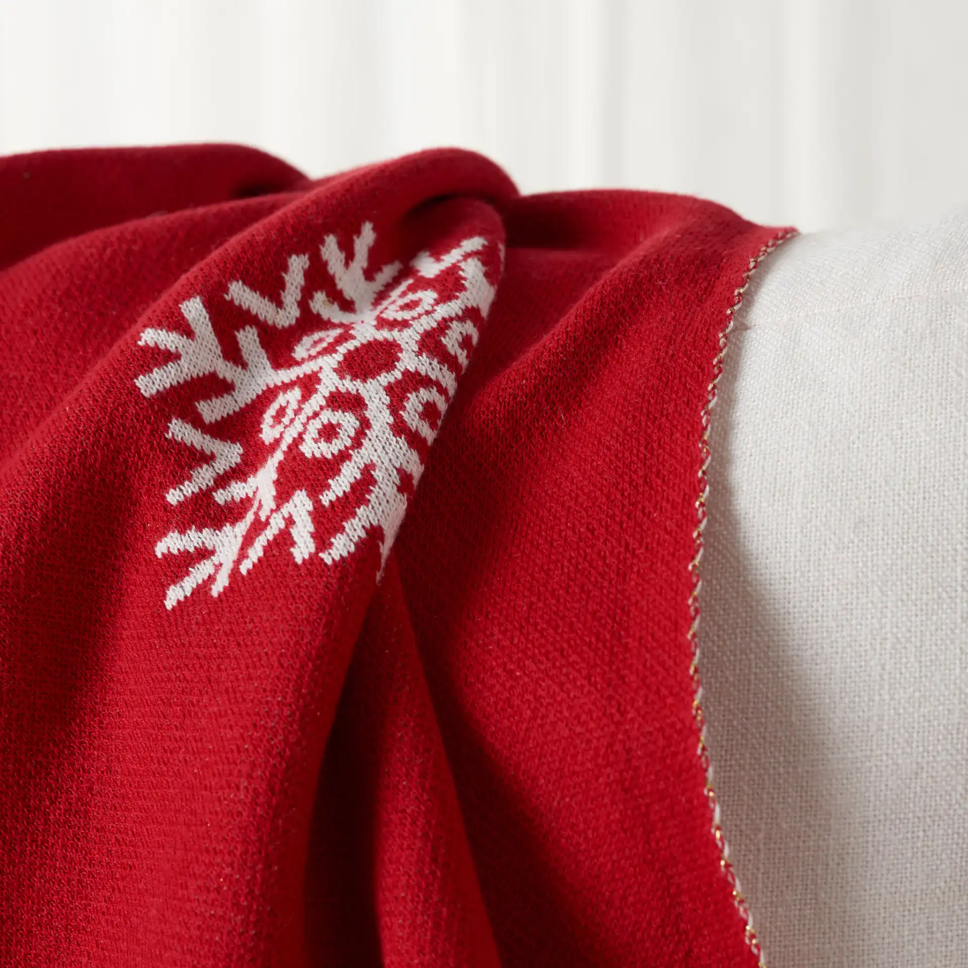 Frosty Wish Throw in Red / White in a styled room