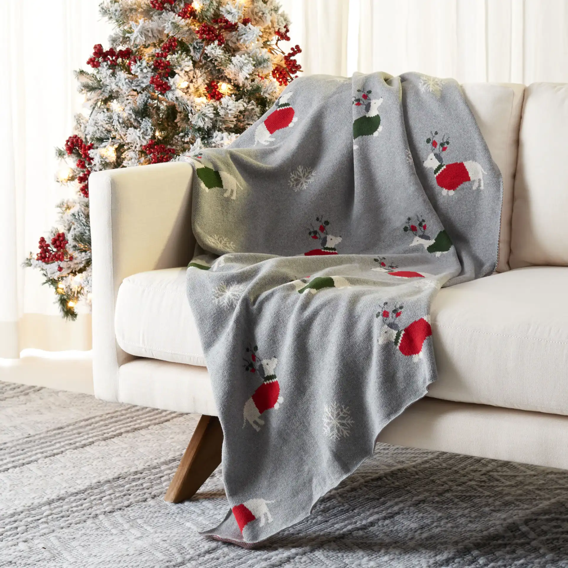 Sleighbells Throw in Gray / Red in a styled room