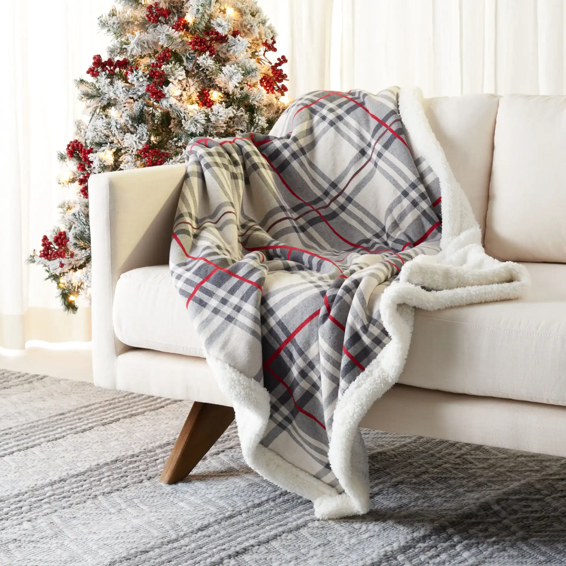 Ribbon Throw in Gray / Red in a styled room