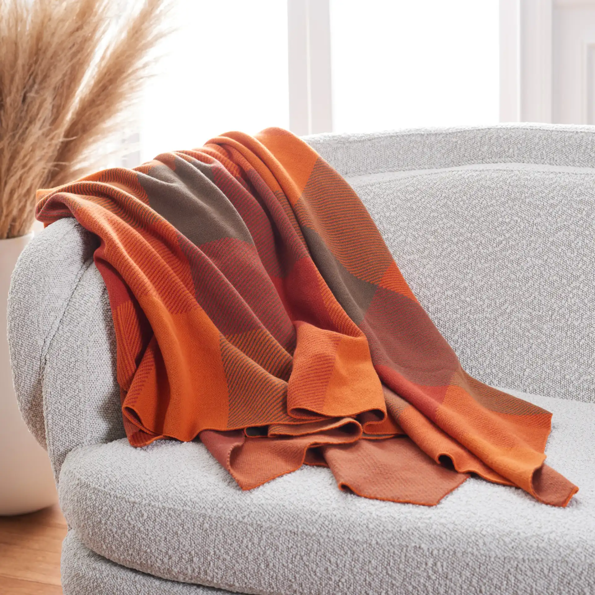 Harvest Throw in Orange in a styled room