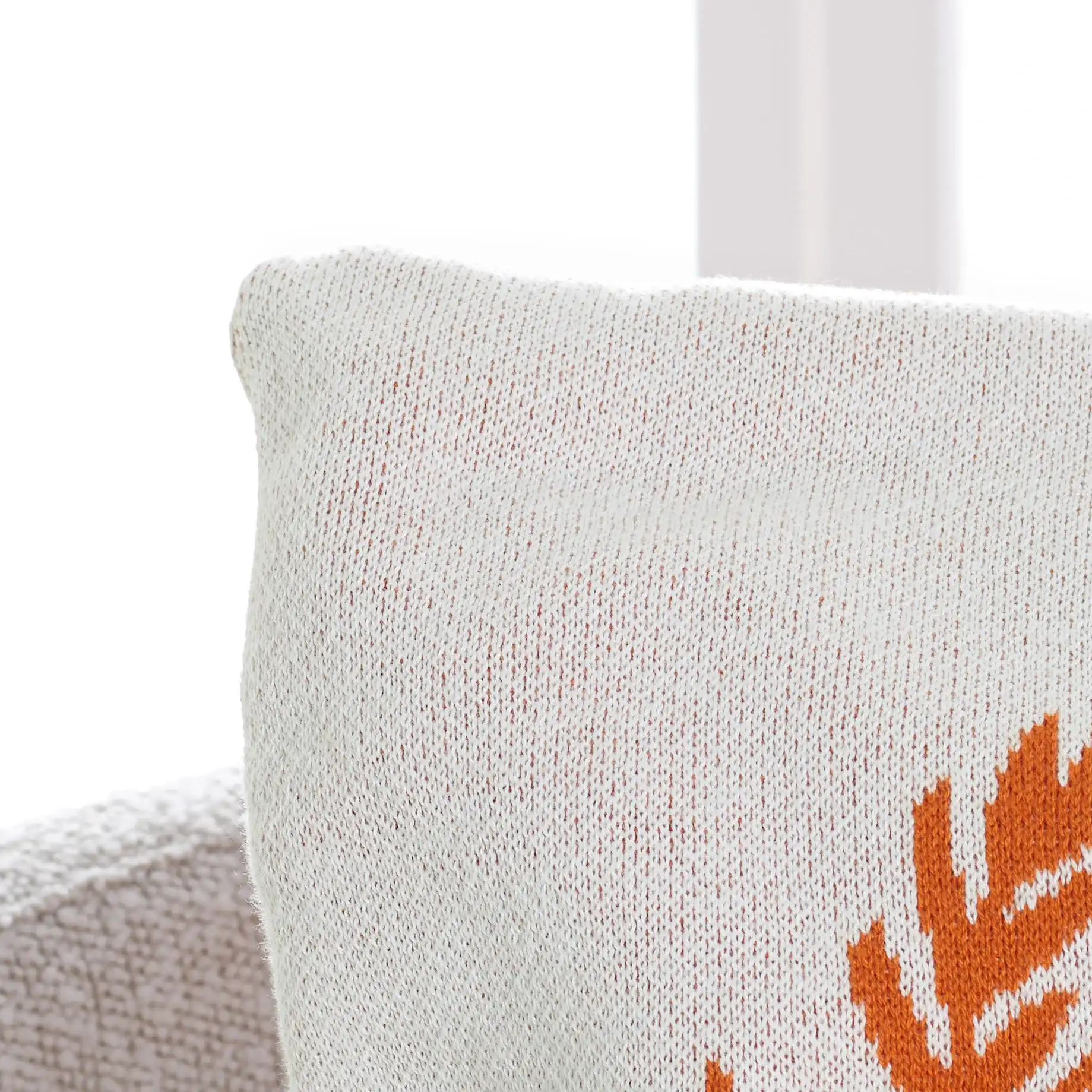 Grateful Blessed Pillow in Orange / Natural / Red in a styled room
