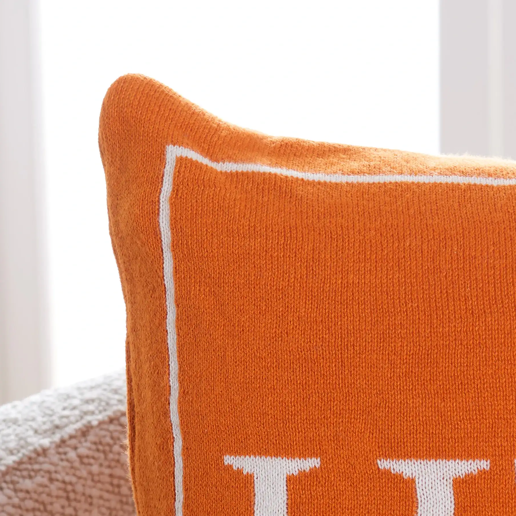 Fall Pillow in Orange / Natural in a styled room