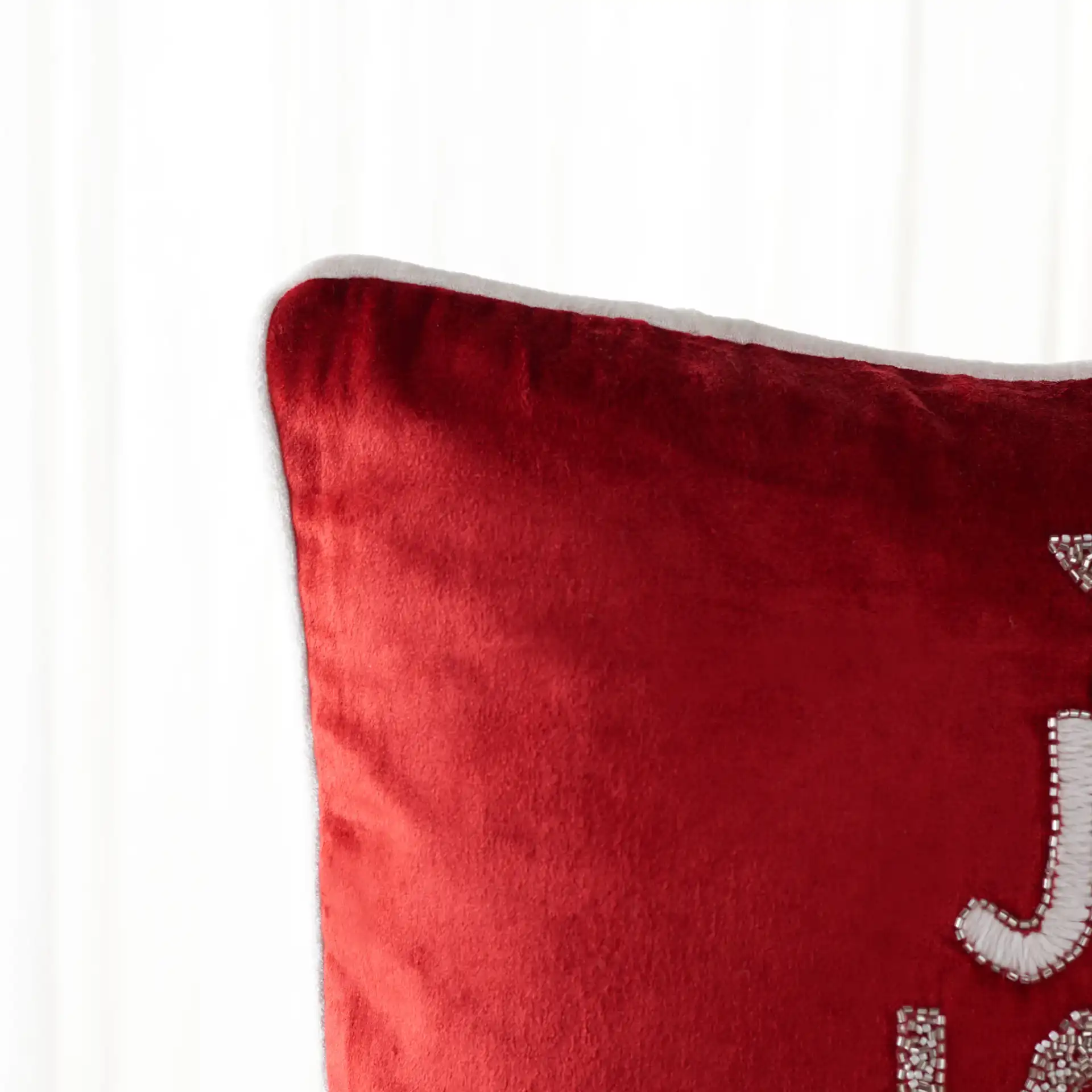 Peace And Joy Pillow in Red in a styled room