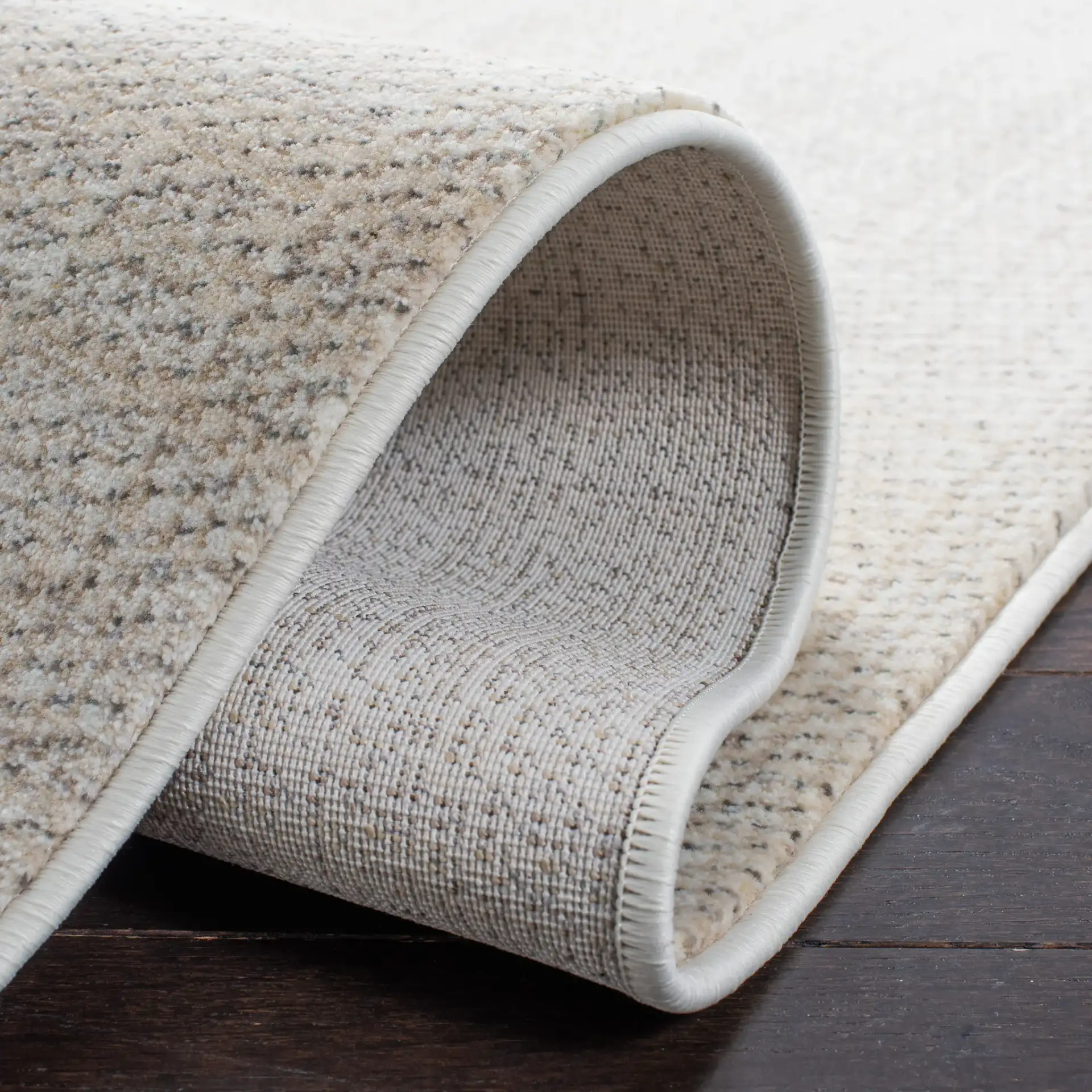 Herat Textured Solid Rug in Ivory / Beige in a styled room