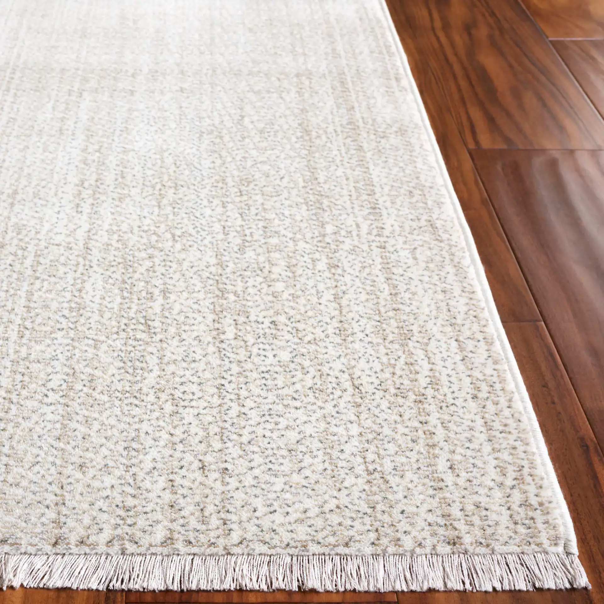 Herat Textured Solid Rug in Ivory / Beige in a styled room