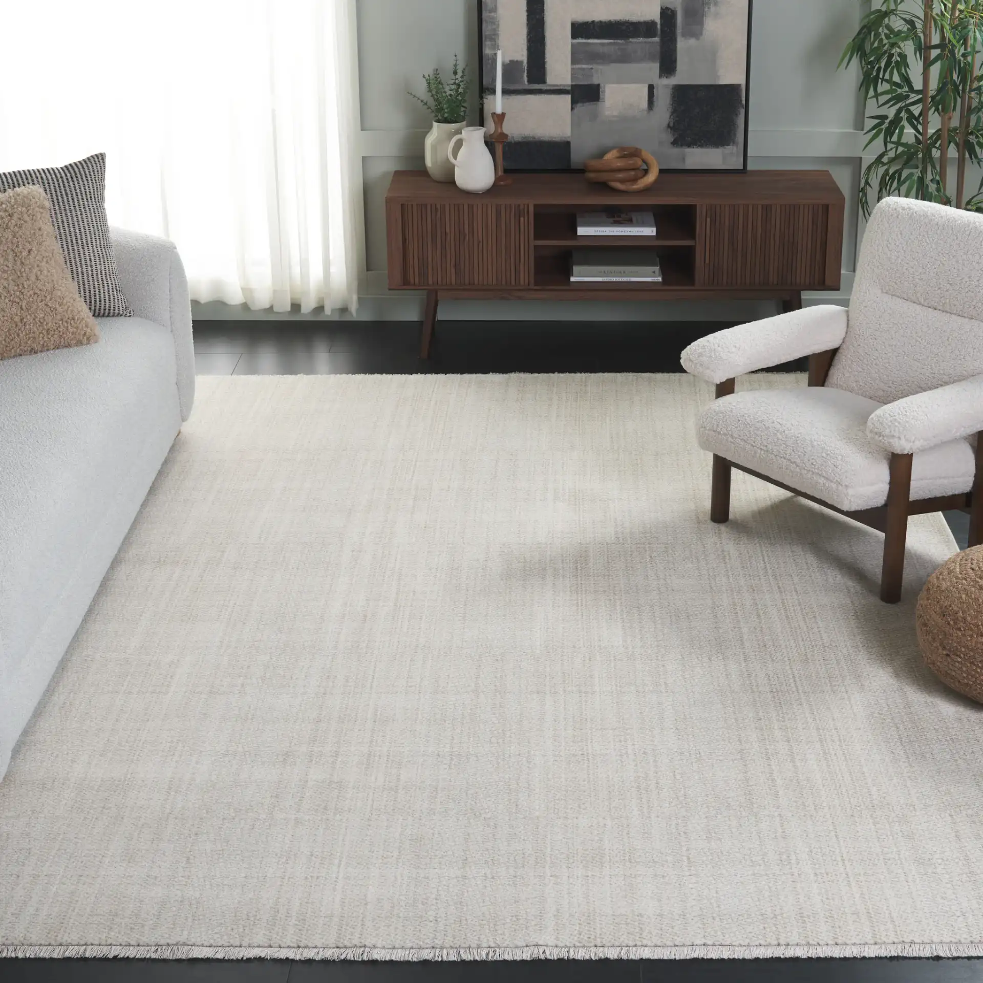 Herat Textured Solid Rug in Ivory / Beige in a styled room