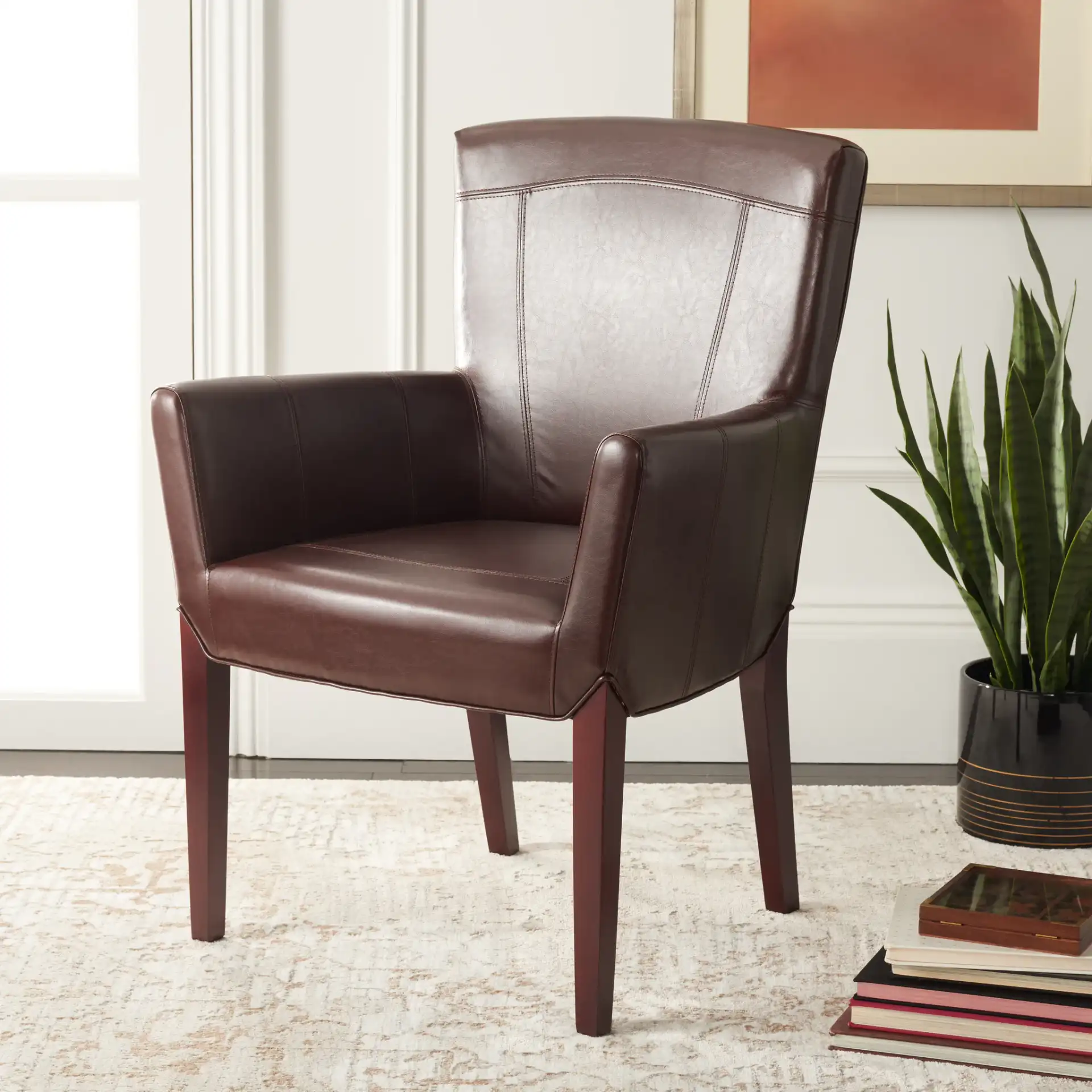 Ken Arm Chair in Brown in a styled room
