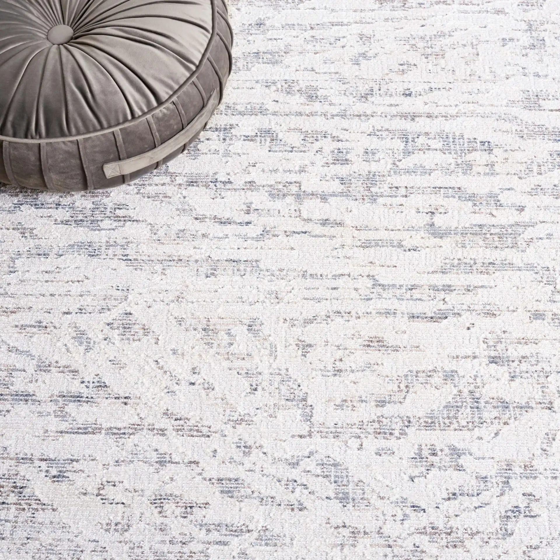 Hunter Weathered Border Rug in Ivory / Dark Gray in a styled room