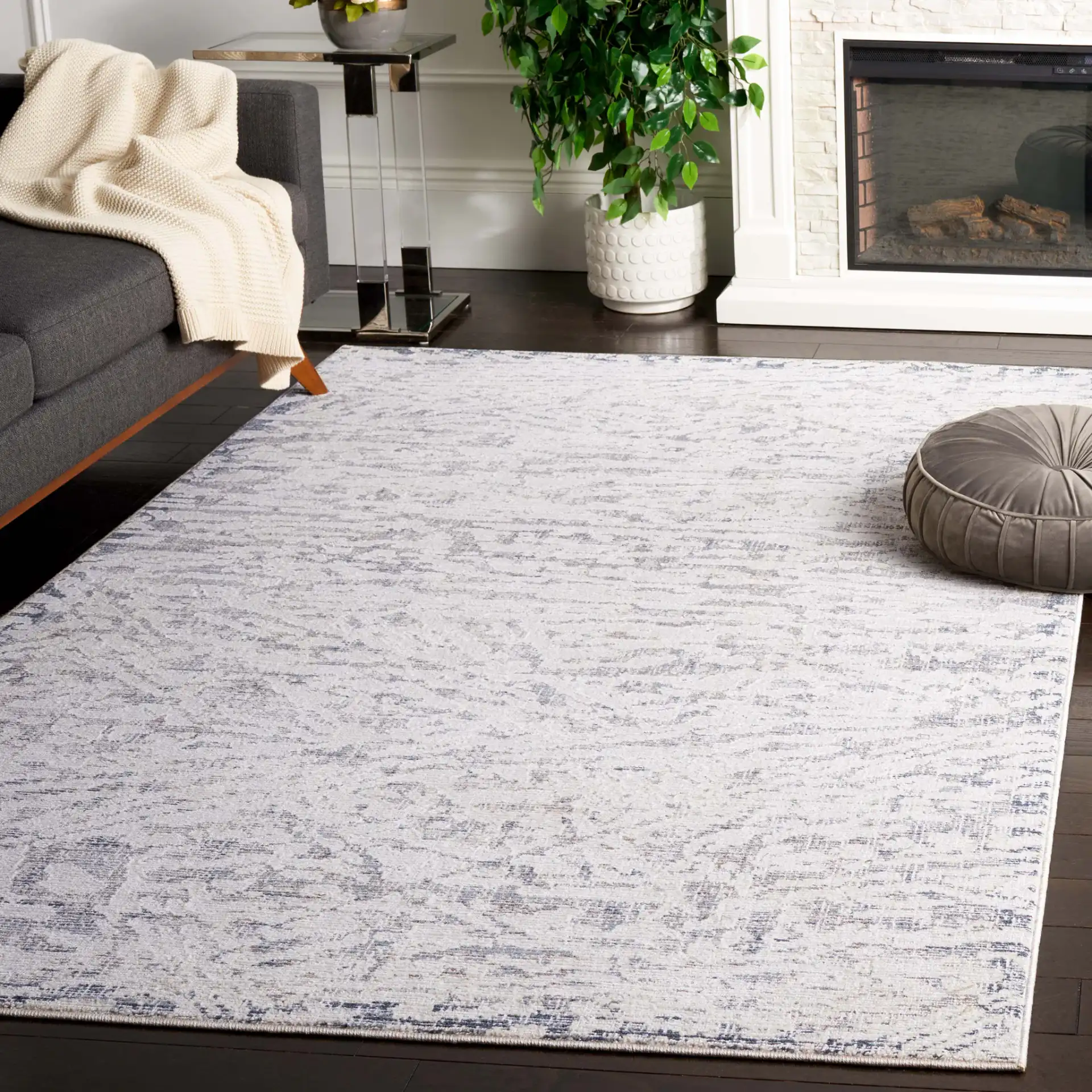 Hunter Weathered Border Rug in Ivory / Dark Gray in a styled room