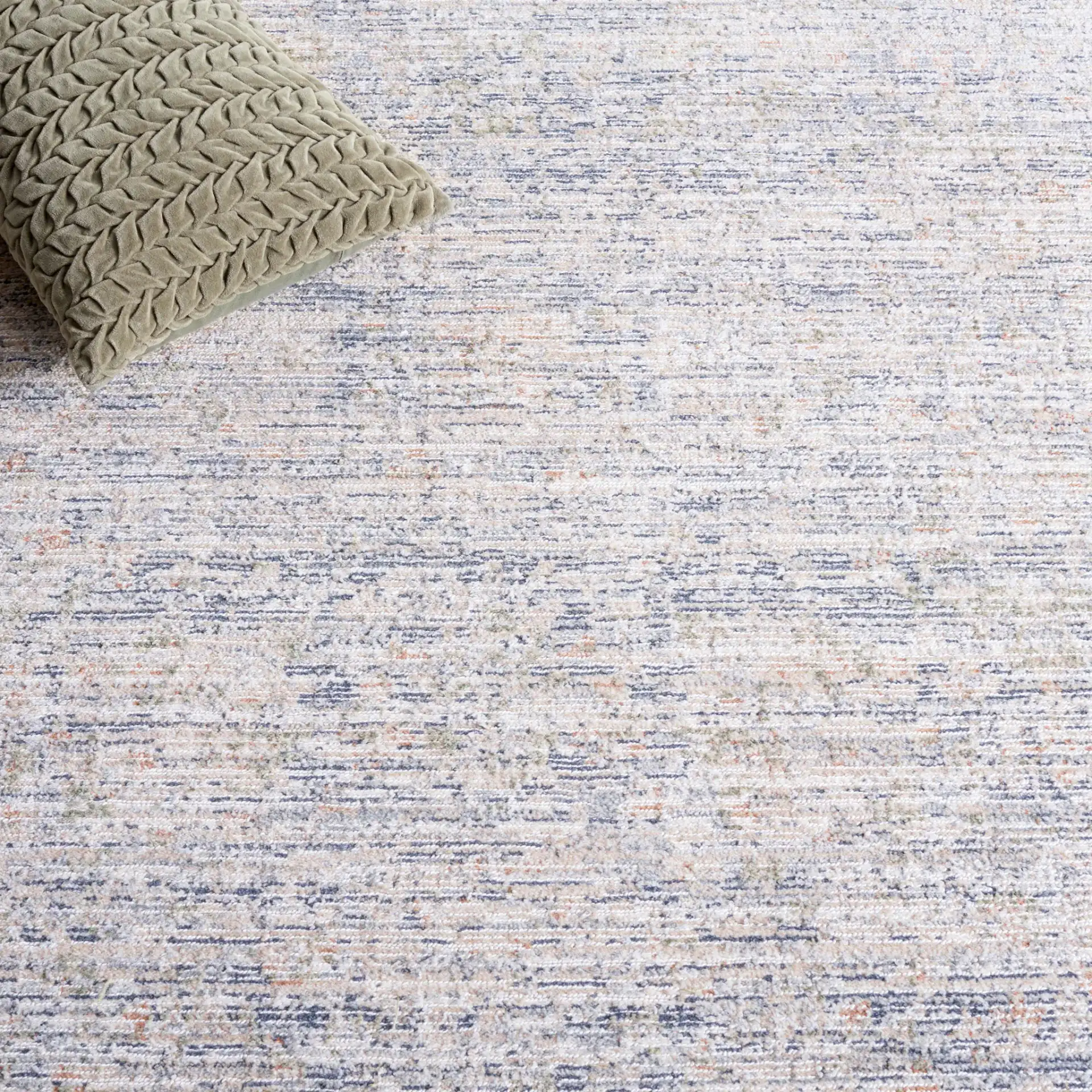Hunter Striated Abstract Rug in Ivory / Dark Gray / Sage in a styled room