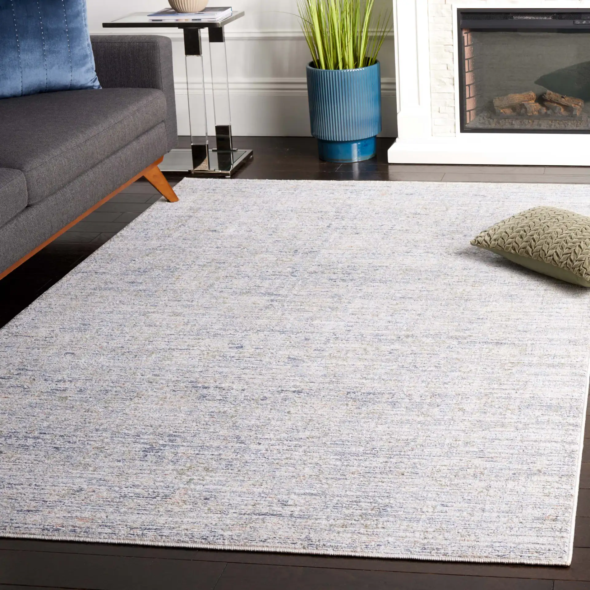 Hunter Striated Abstract Rug in Ivory / Dark Gray / Sage in a styled room