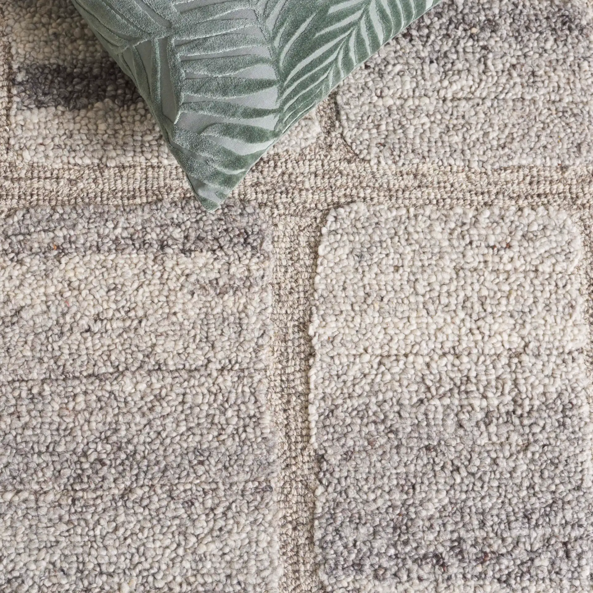Harvest Cobblestone Hand-Tufted Wool Rug in Taupe / Gray in a styled room