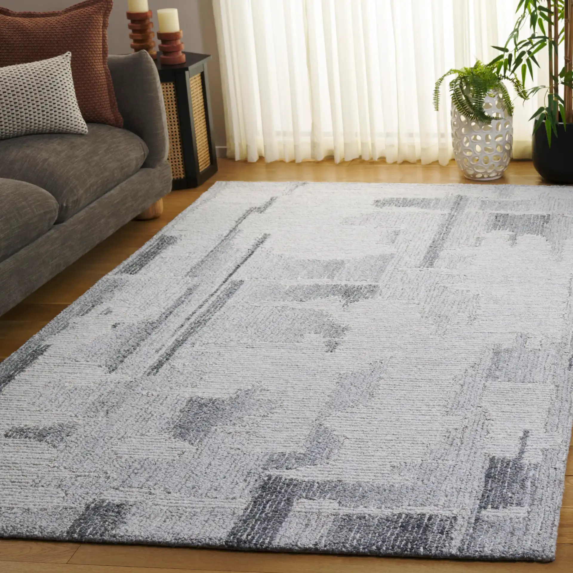 Harvest Abstract Blocks Hand-Tufted Wool Rug in Gray / Ivory in a styled room