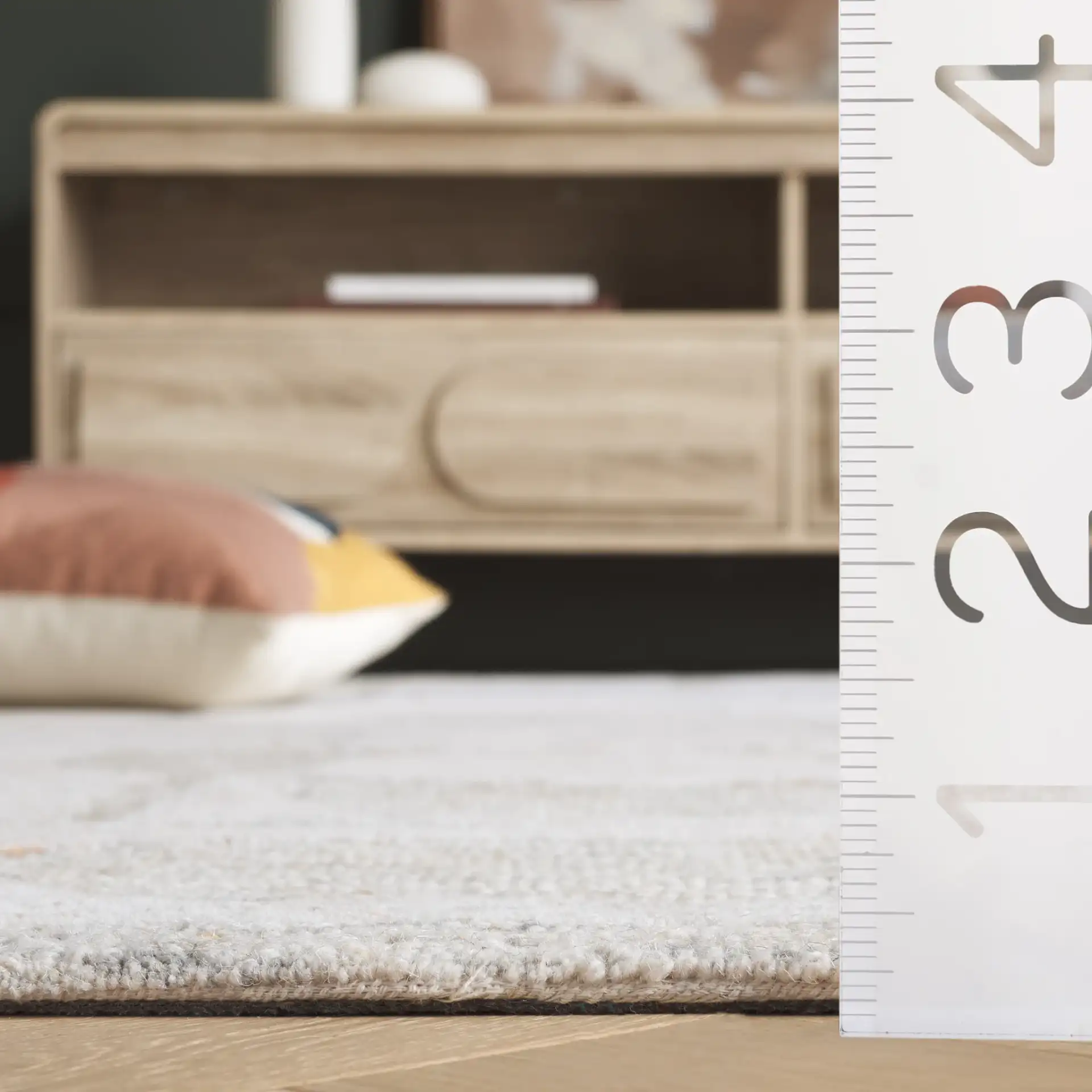 Harvest Arch And Block Hand-Tufted Wool Rug in Gray / Rust in a styled room