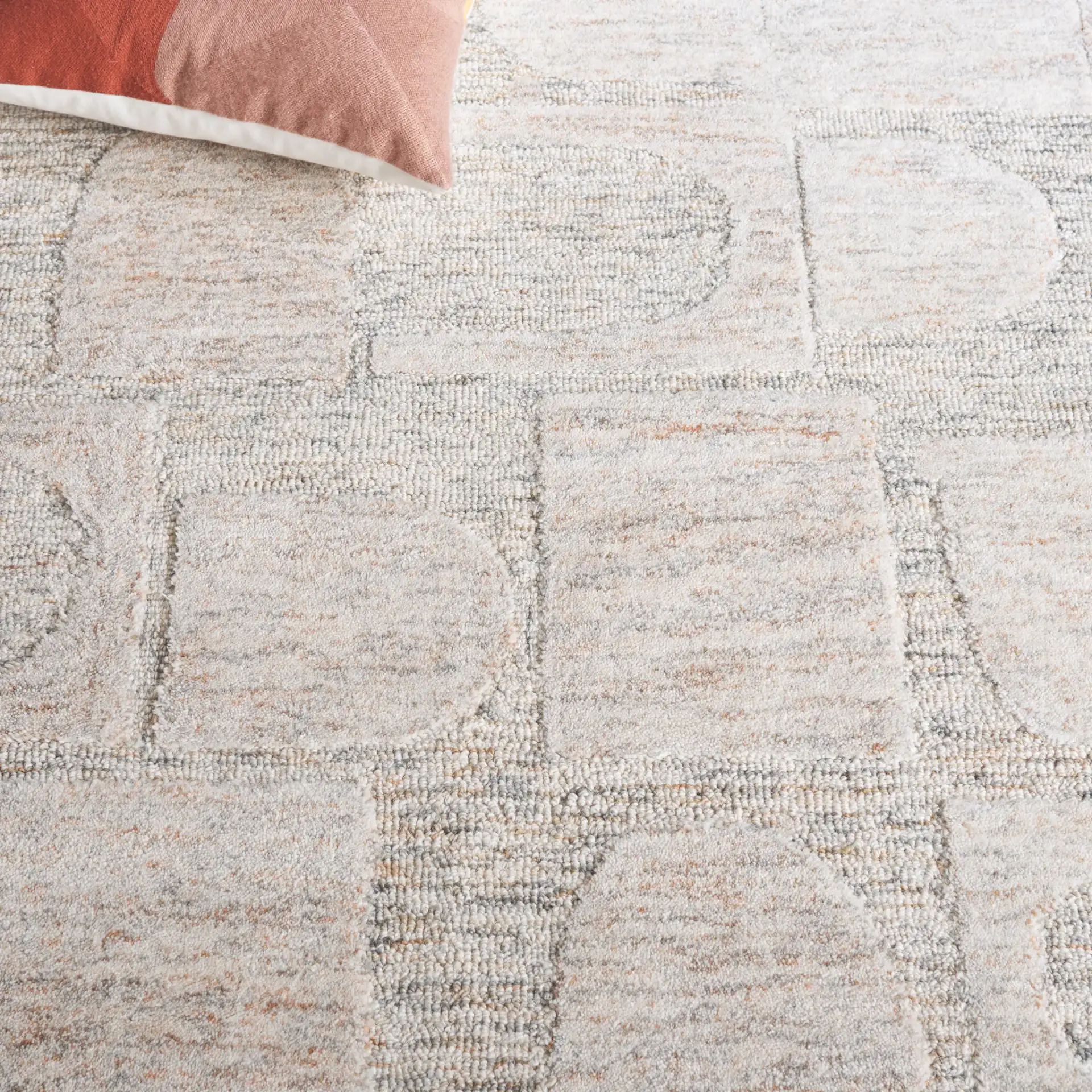 Harvest Arch And Block Hand-Tufted Wool Rug in Gray / Rust in a styled room