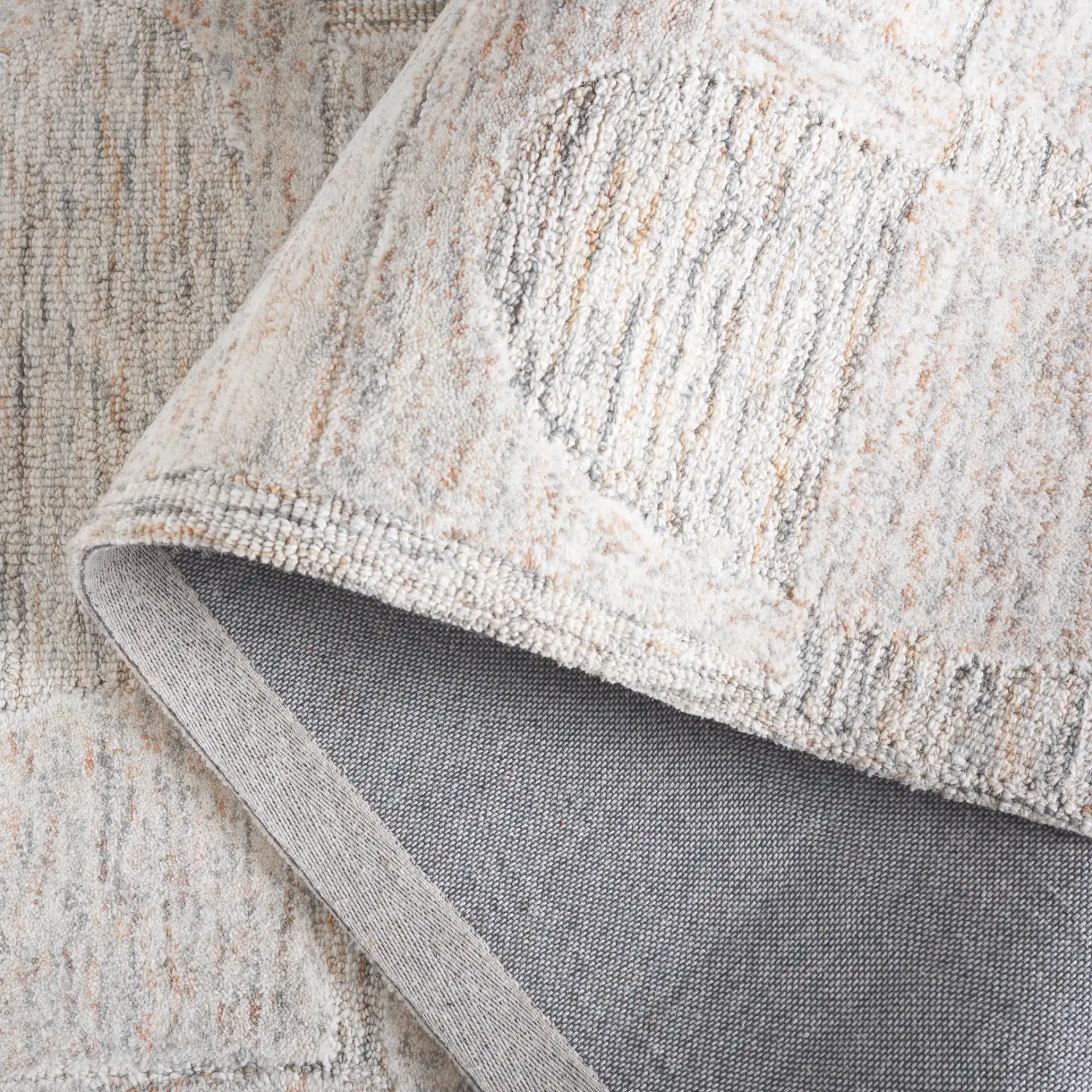 Harvest Arch And Block Hand-Tufted Wool Rug in Gray / Rust in a styled room