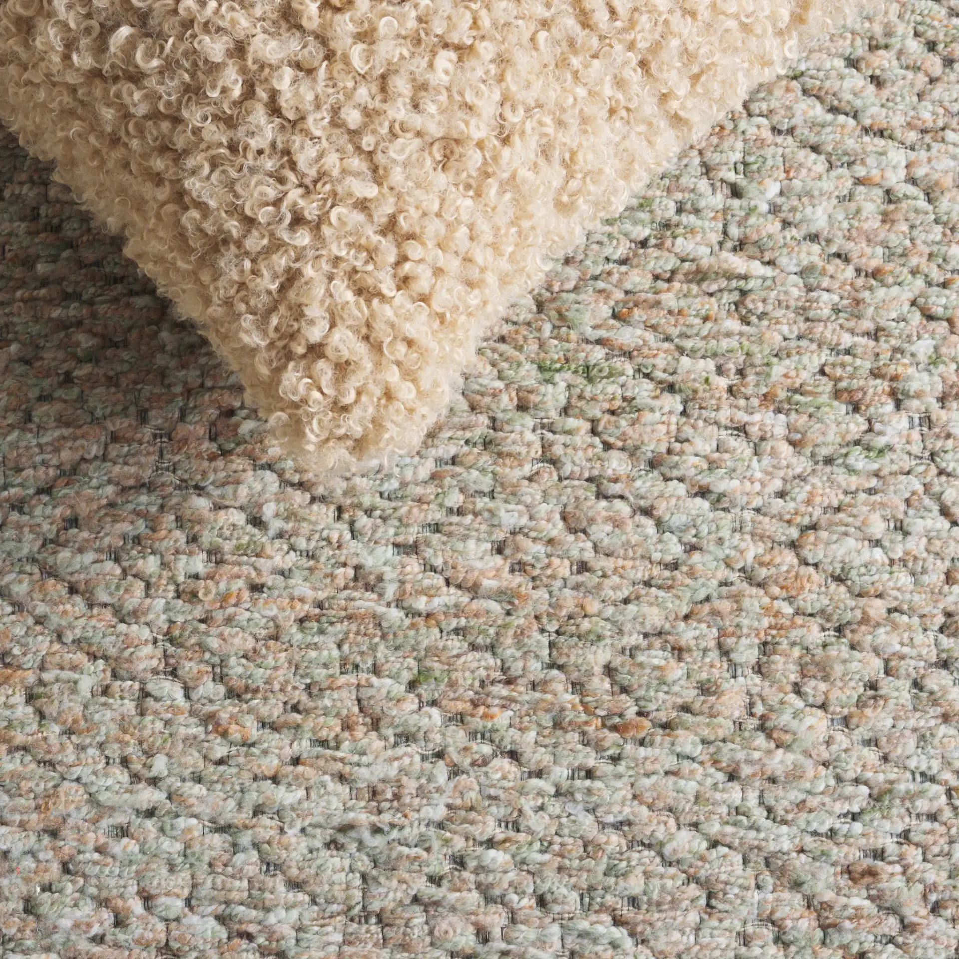 Harvest Diamond Hand-Woven Rug in Green / Beige in a styled room